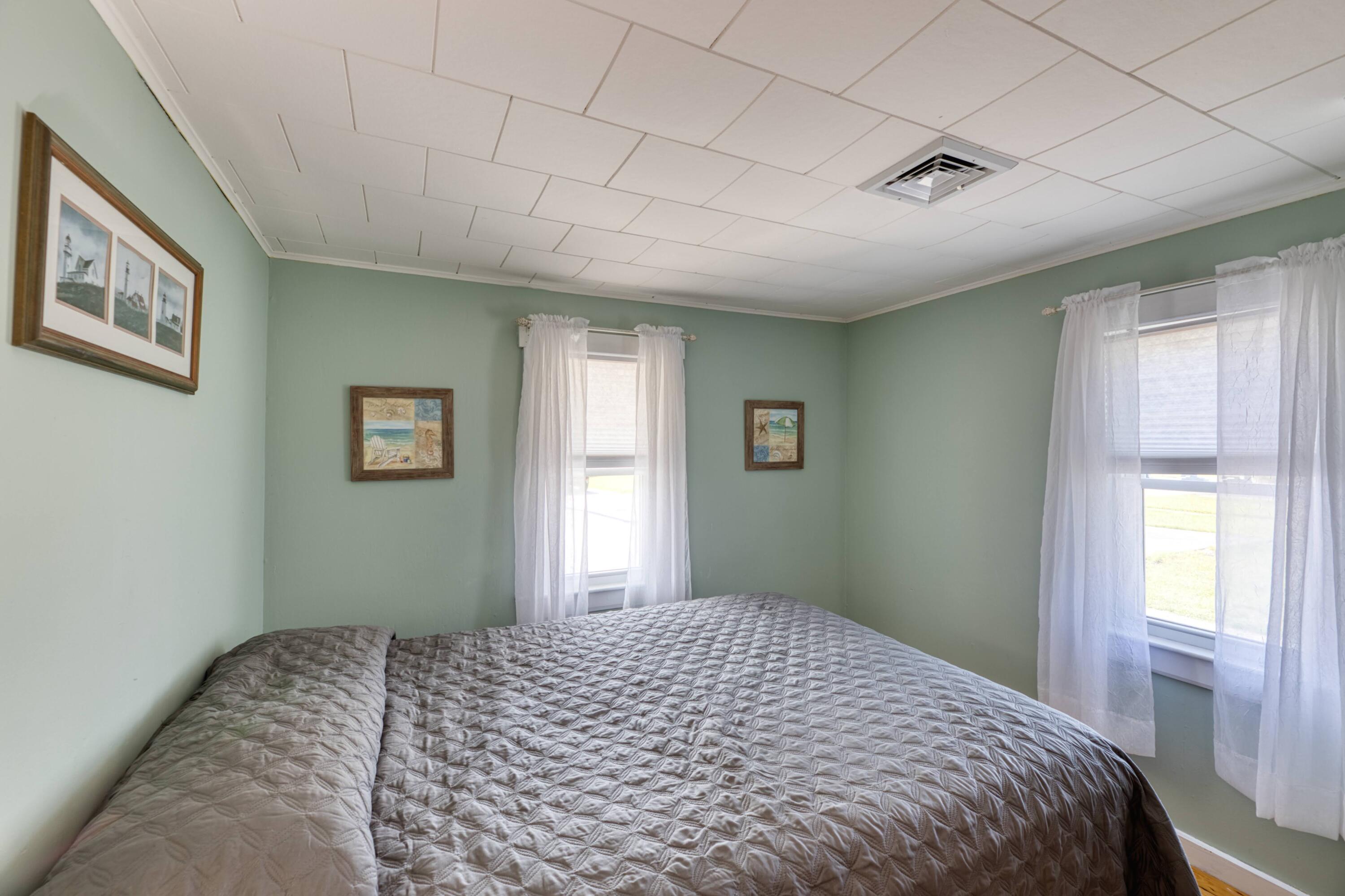 41 Bourne Neck Drive Buzzards Bay, MA 02532 - Photo 34 of 52 a bedroom with a bed and a window