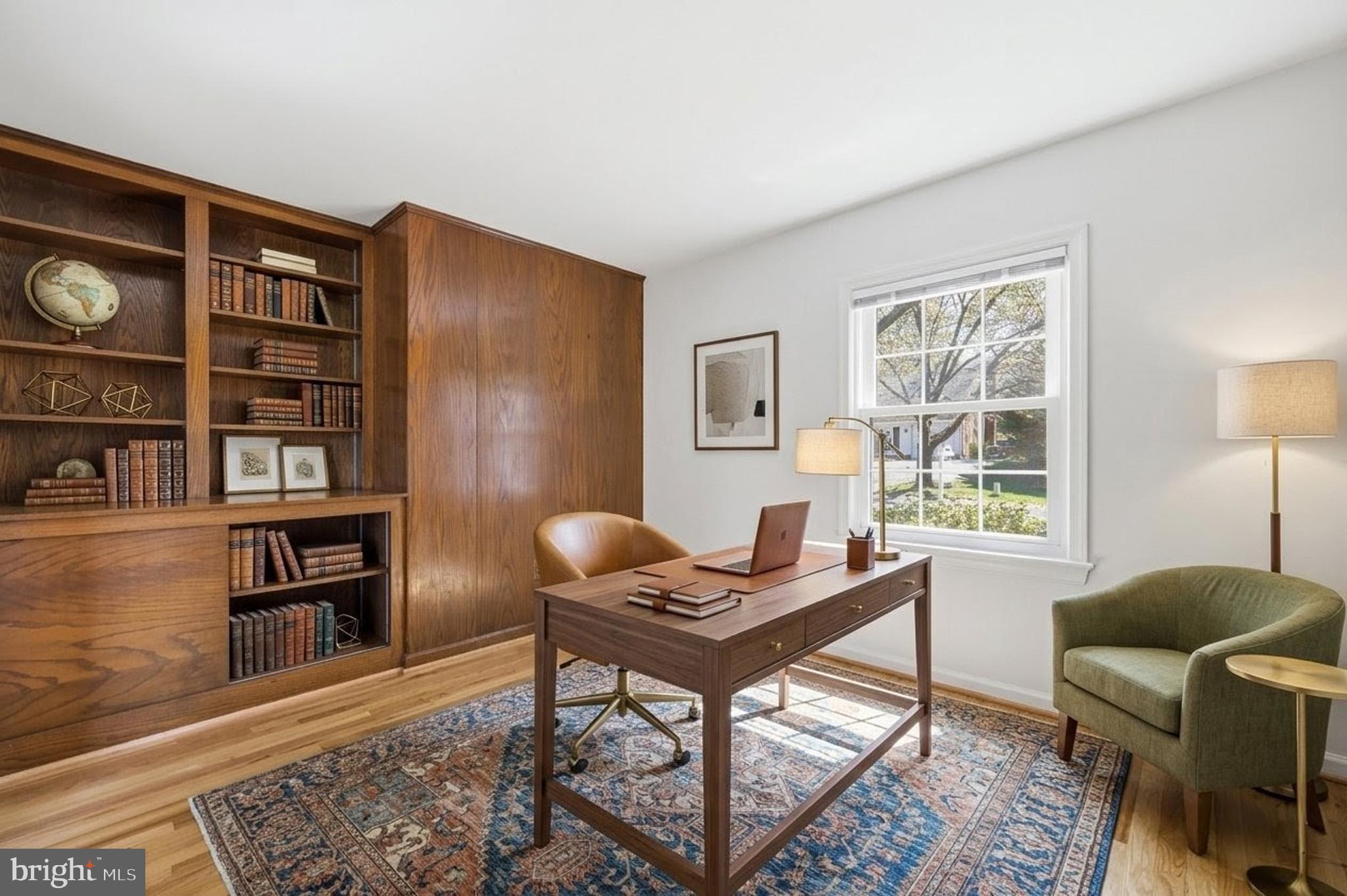 12428 Over Ridge Road Potomac, MD 20854 - Photo 17 of 81 a living room with furniture and a window