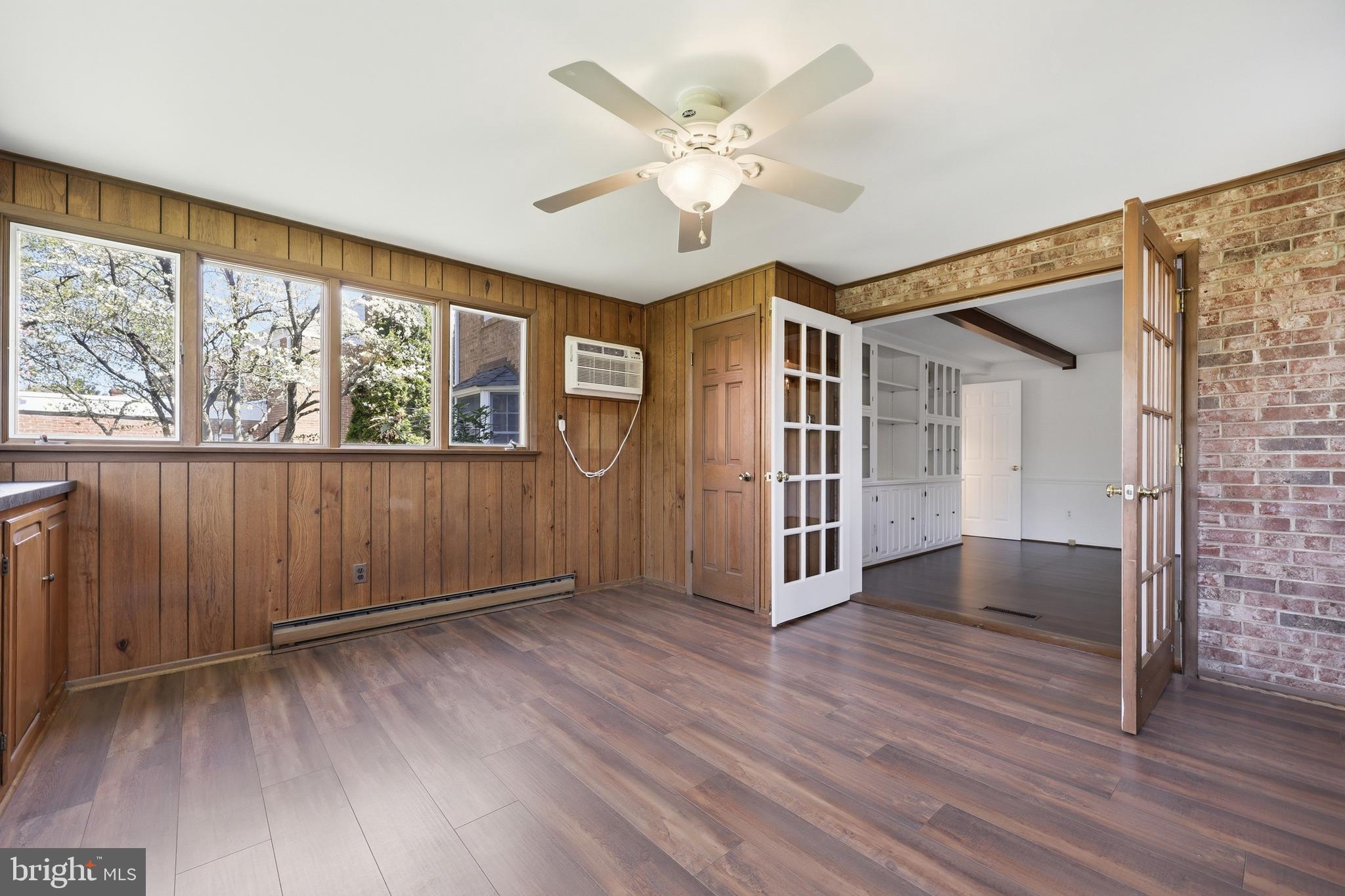 12428 Over Ridge Road Potomac, MD 20854 - Photo 23 of 81 wooden floor in an empty room with a window