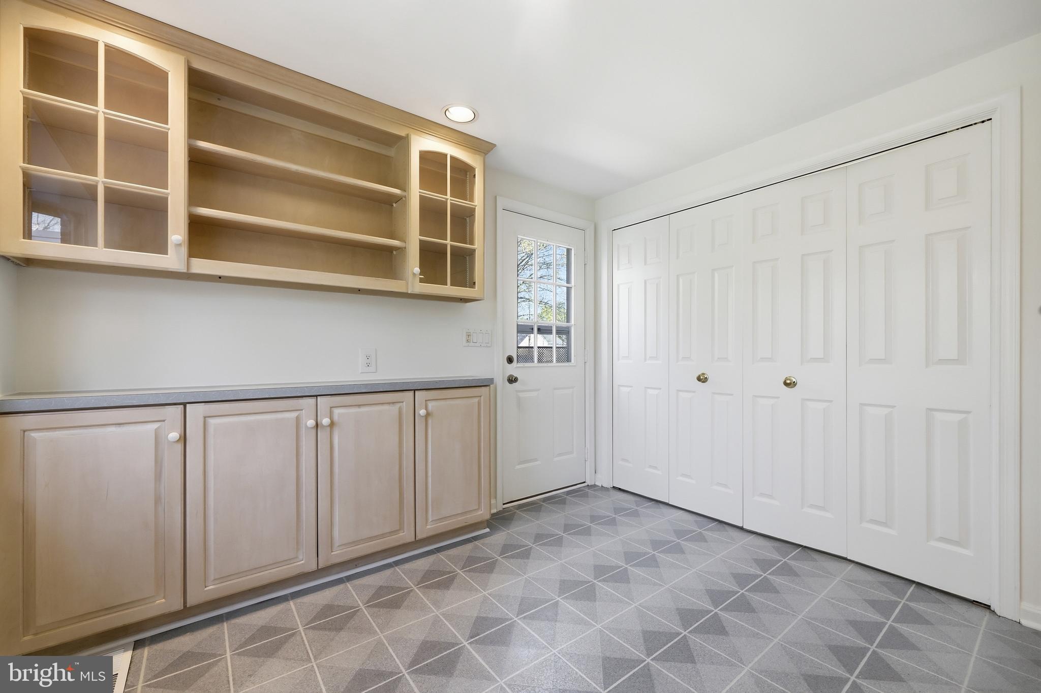 12428 Over Ridge Road Potomac, MD 20854 - Photo 31 of 81 a view of an empty room with a window
