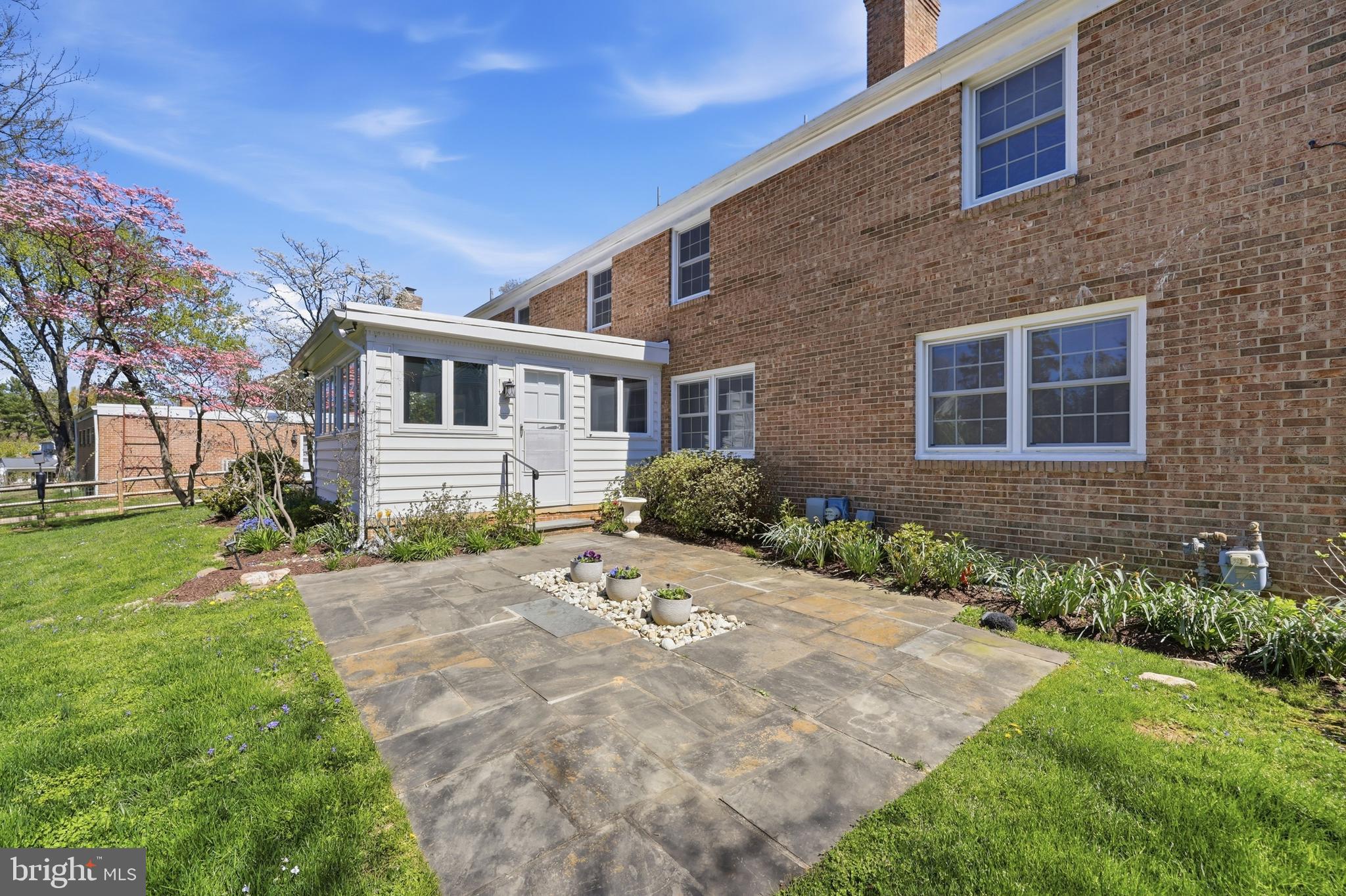 12428 Over Ridge Road Potomac, MD 20854 - Photo 62 of 81 a front view of a house with a yard