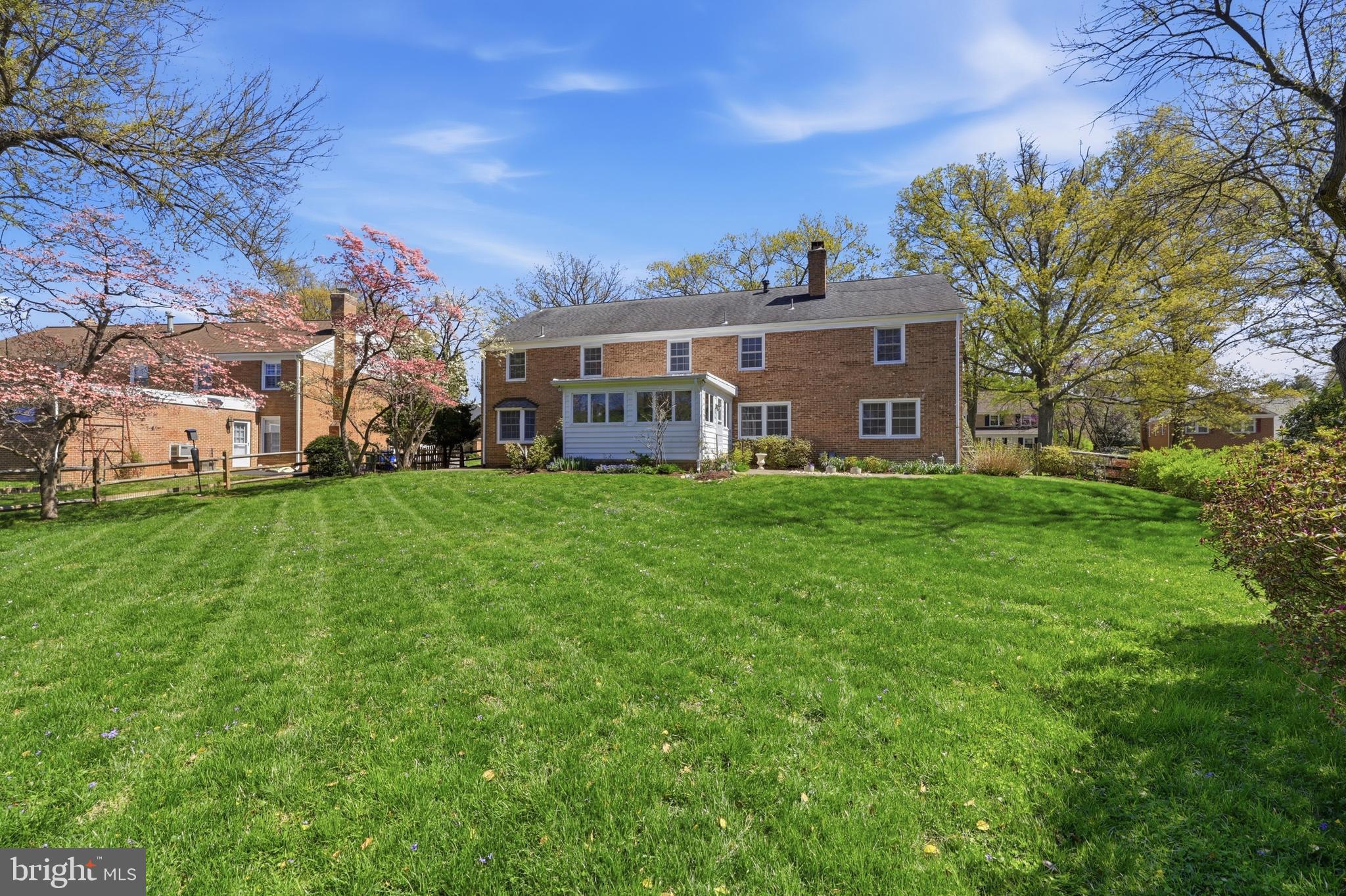 12428 Over Ridge Road Potomac, MD 20854 - Photo 69 of 81 a view of a house with a big yard and large trees