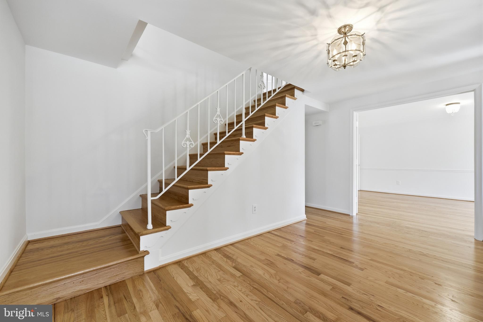 12428 Over Ridge Road Potomac, MD 20854 - Photo 7 of 81 a view of entryway and hall with wooden floor