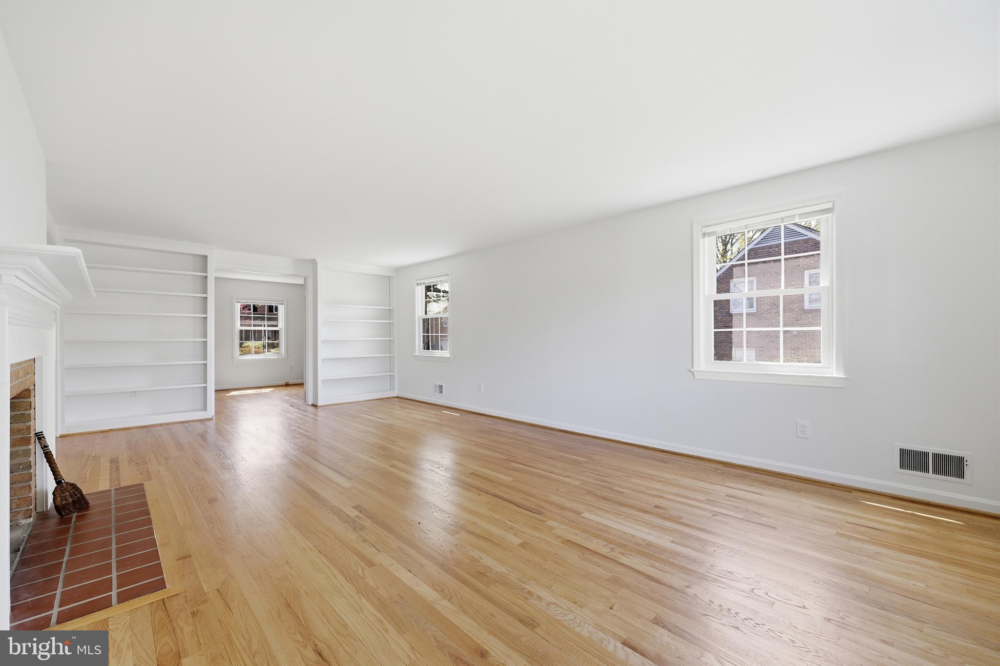 12428 Over Ridge Road Potomac, MD 20854 - Photo 10 of 81 wooden floor in an empty room with a window