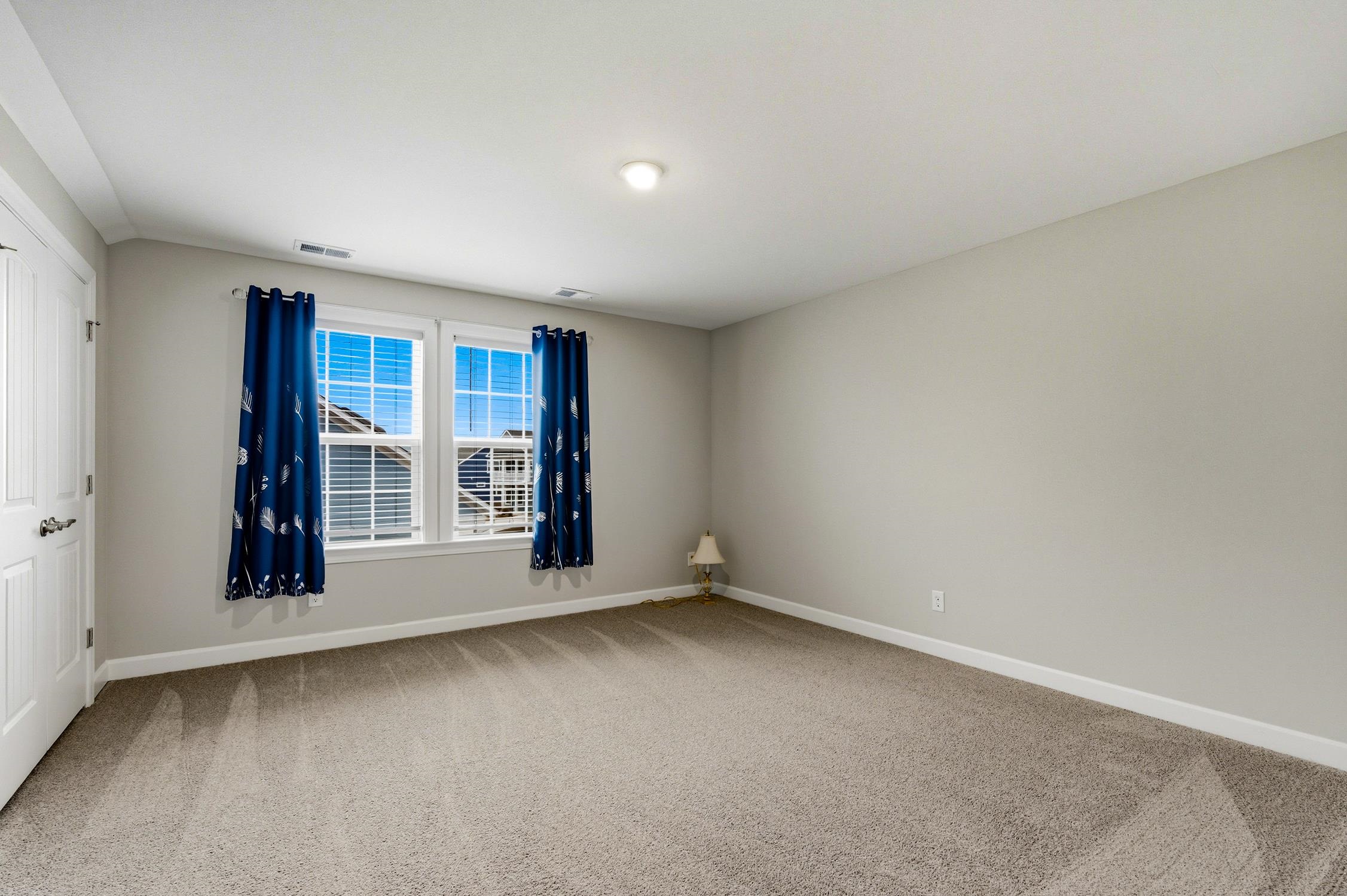 236 Bluestem Loop Little River, SC 29566 - Photo 26 of 40 Game room featuring light colored carpet and baseboards
