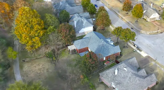 a front of a house with a yard