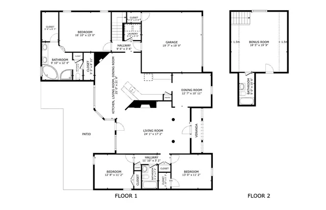 an aerial view of a house with a yard and trees