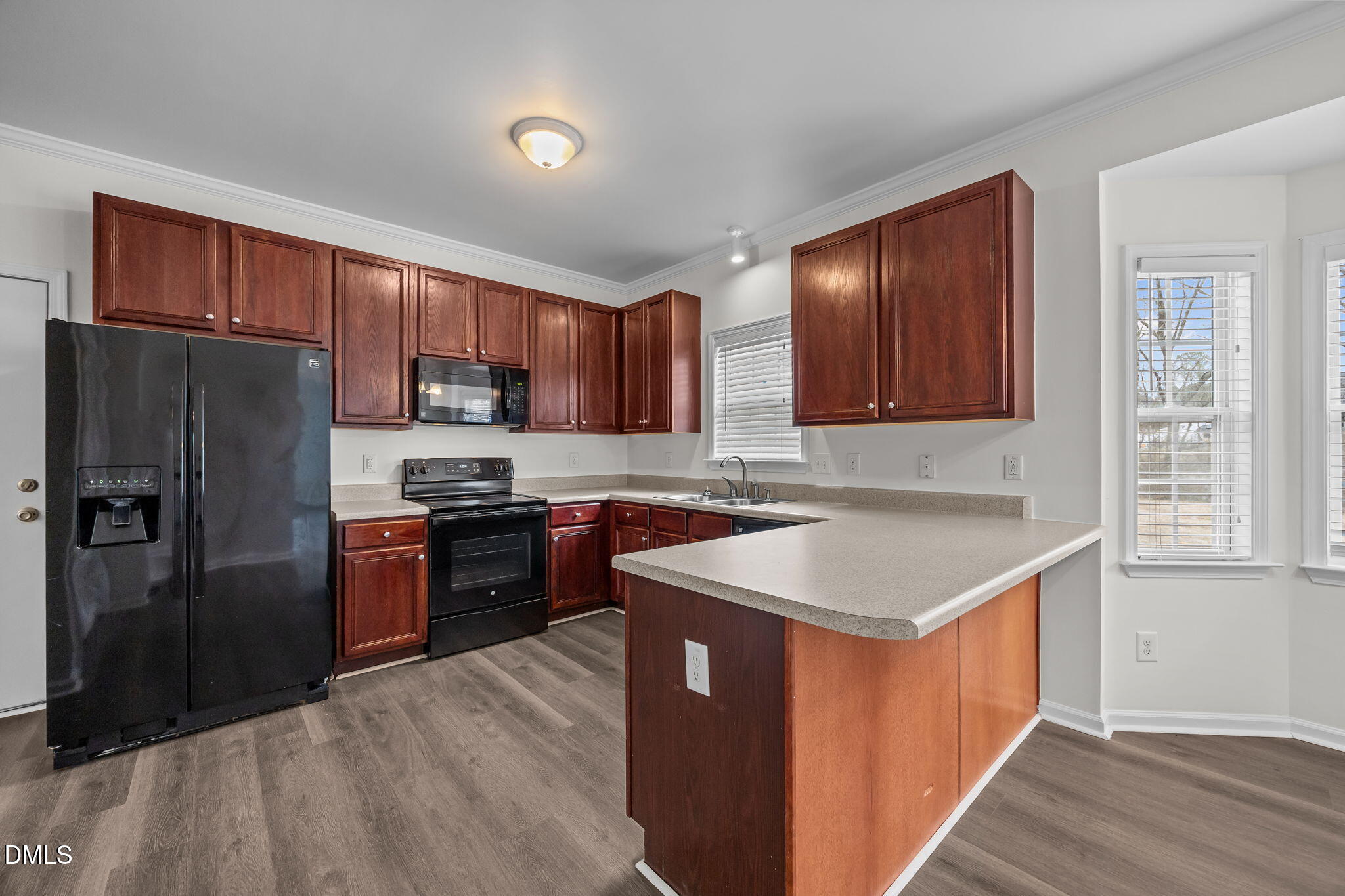 1305 Tawny View Lane Raleigh, NC 27603 - Photo 13 of 47 a kitchen with stainless steel appliances granite countertop a refrigerator a sink dishwasher a stove with wooden cabinets and a refrigerator