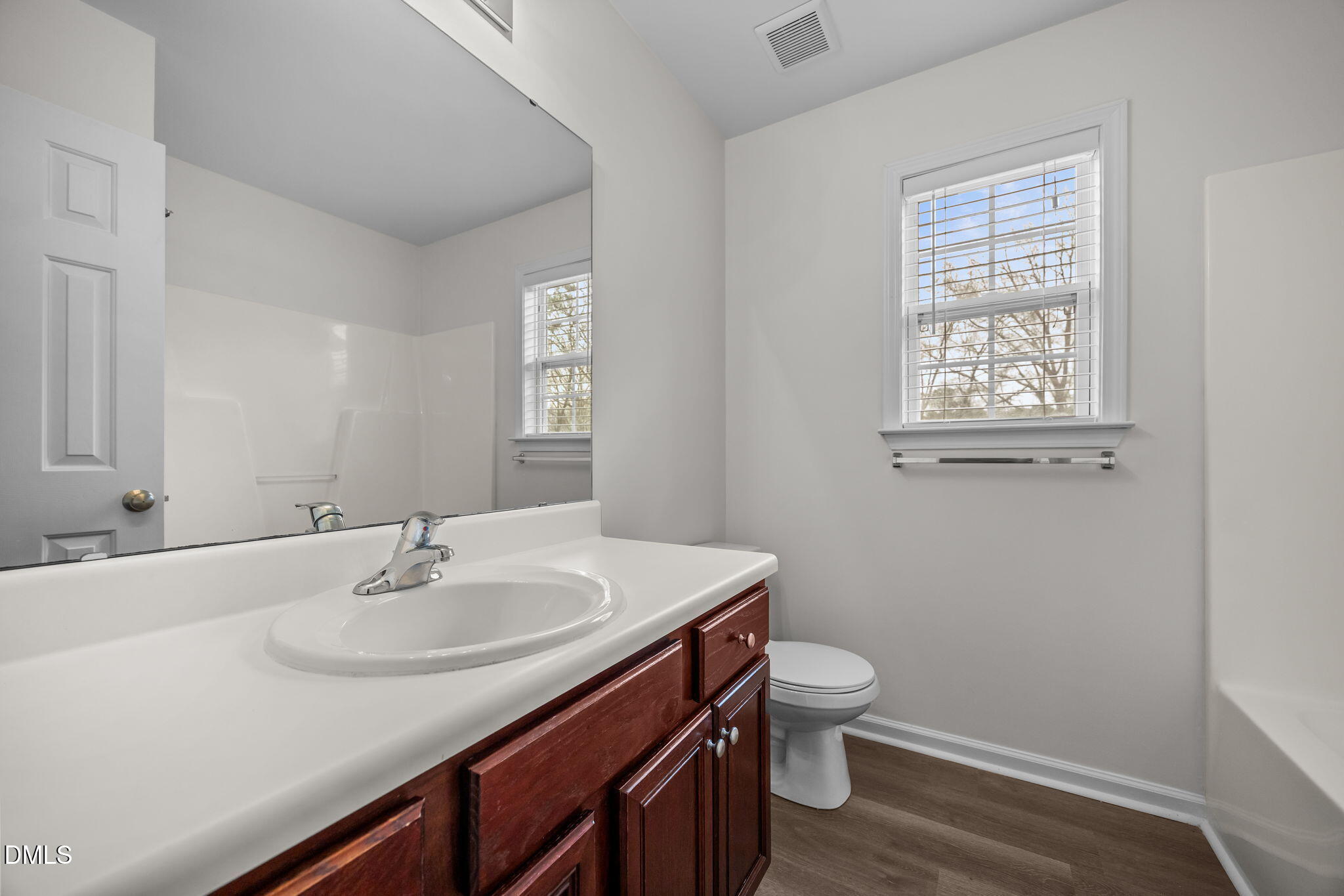 1305 Tawny View Lane Raleigh, NC 27603 - Photo 20 of 47 a bathroom with a sink toilet and vanity