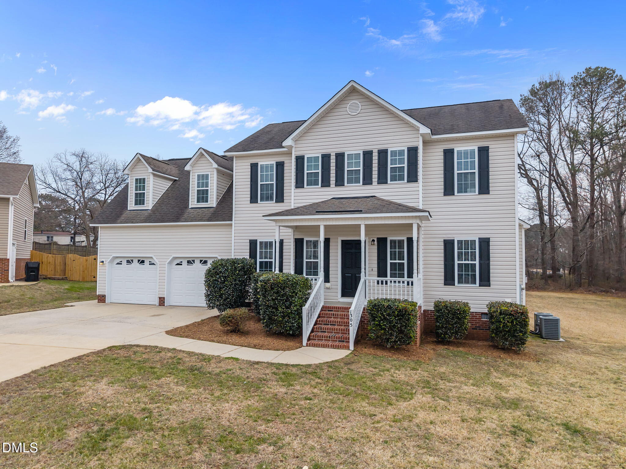 1305 Tawny View Lane Raleigh, NC 27603 - Photo 2 of 47 a front view of a house with a yard