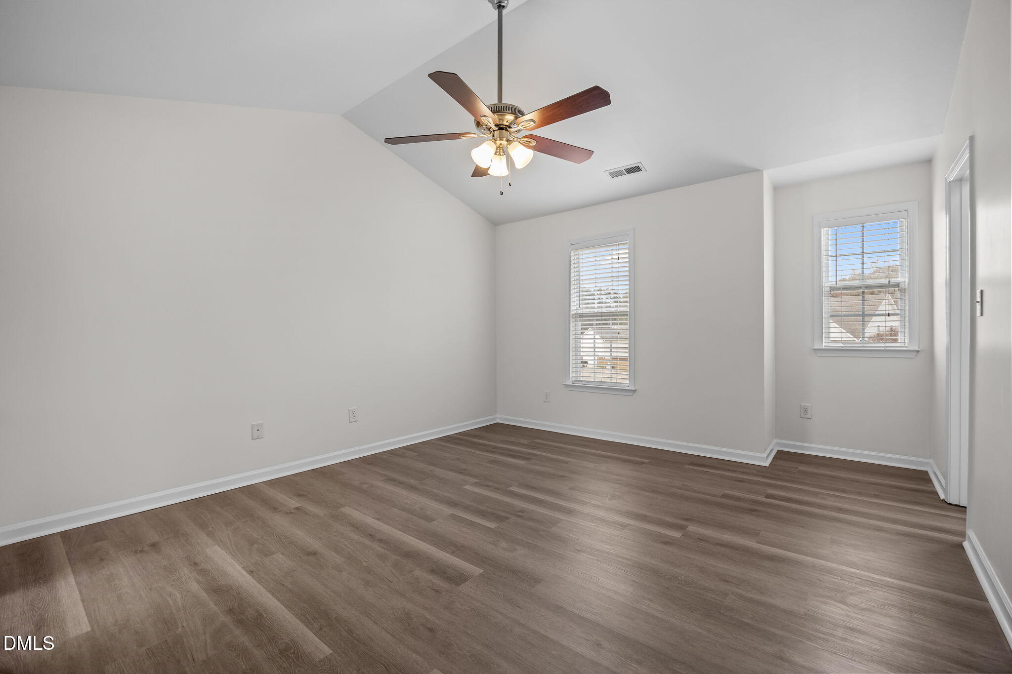 1305 Tawny View Lane Raleigh, NC 27603 - Photo 22 of 47 wooden floor in an empty room with a window