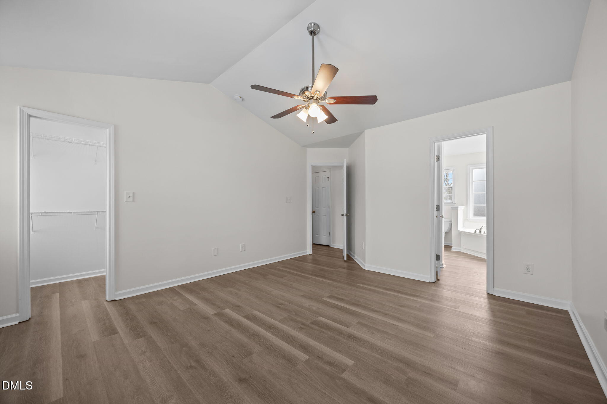 1305 Tawny View Lane Raleigh, NC 27603 - Photo 23 of 47 an empty room with wooden floor ceiling fan and window