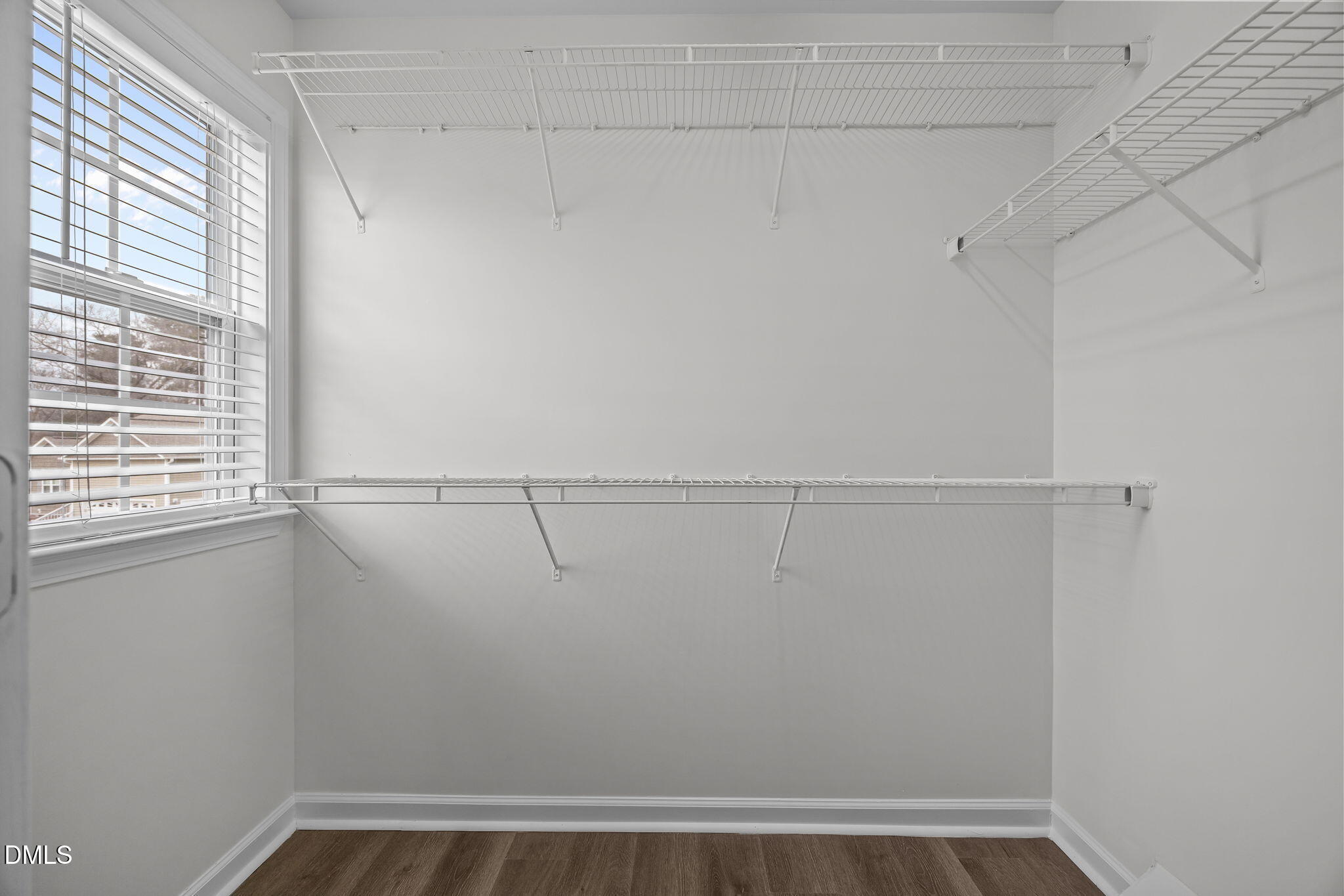 1305 Tawny View Lane Raleigh, NC 27603 - Photo 24 of 47 a view of a room with racks on the wall
