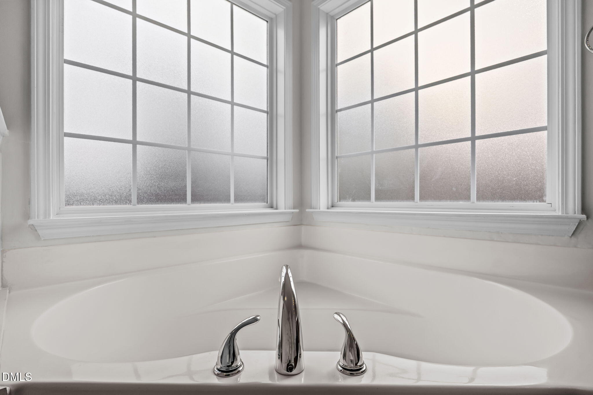 1305 Tawny View Lane Raleigh, NC 27603 - Photo 27 of 47 a bath tub sitting next to a window