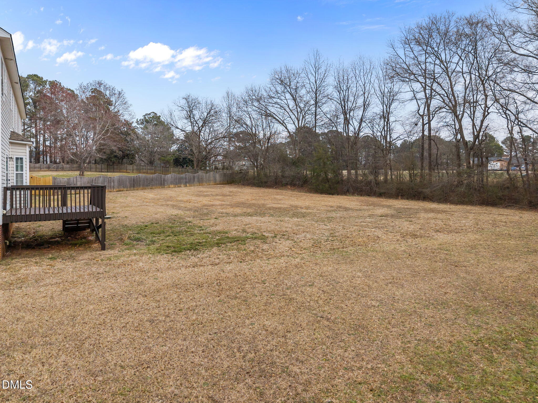 1305 Tawny View Lane Raleigh, NC 27603 - Photo 36 of 47 a backyard of a house with lots of green space
