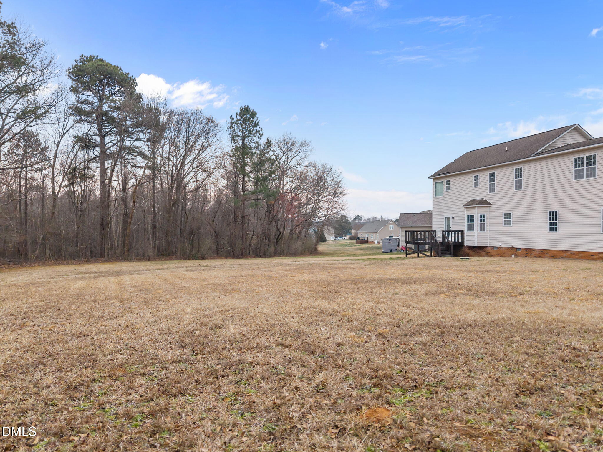 1305 Tawny View Lane Raleigh, NC 27603 - Photo 42 of 47 a view of a big house with a big yard