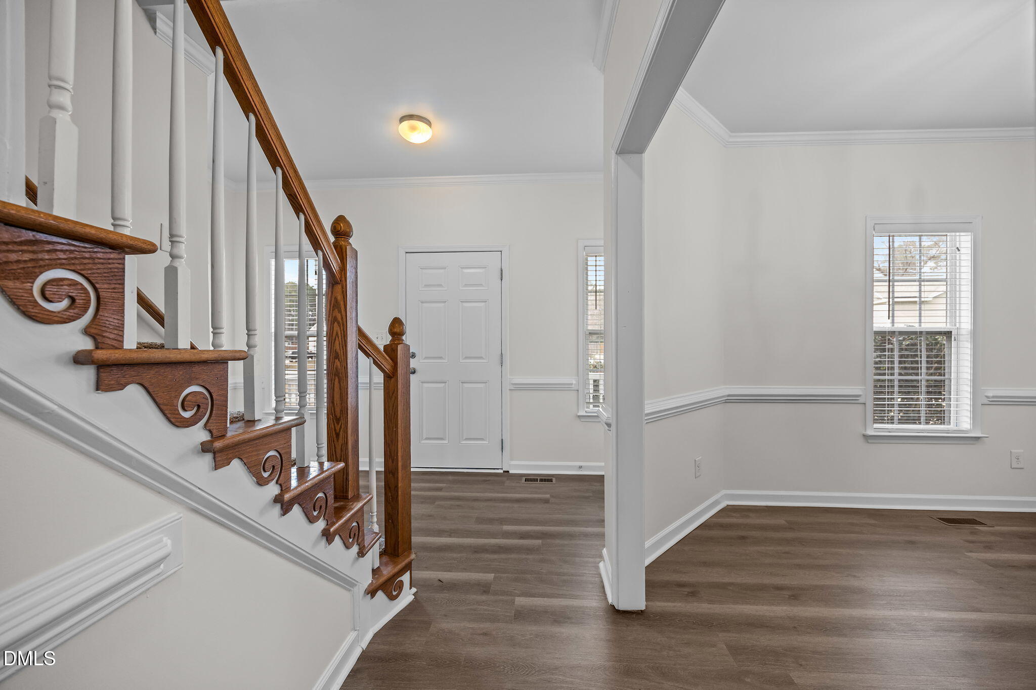 1305 Tawny View Lane Raleigh, NC 27603 - Photo 6 of 47 a view of a hallway view with wooden floor and staircase