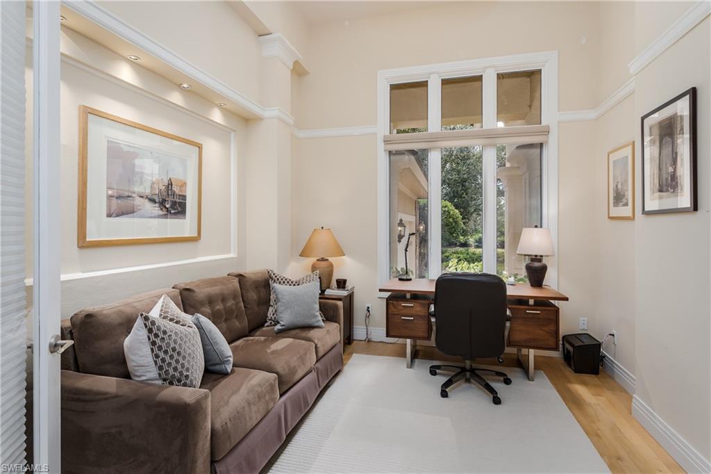 1150 Dimock Lane Naples, FL 34110 - Photo 15 of 40 a living room with furniture and a window