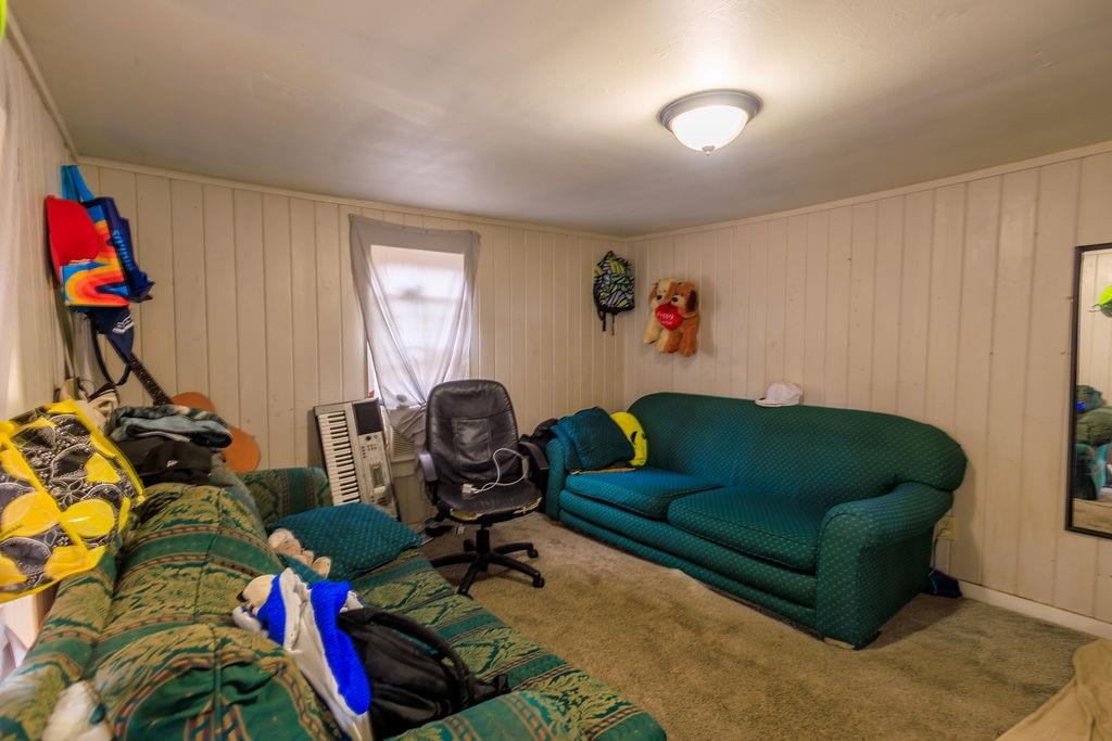 100 Daisy Circle Canton, GA 30114 - Photo 3 of 8 a living room with furniture and a window