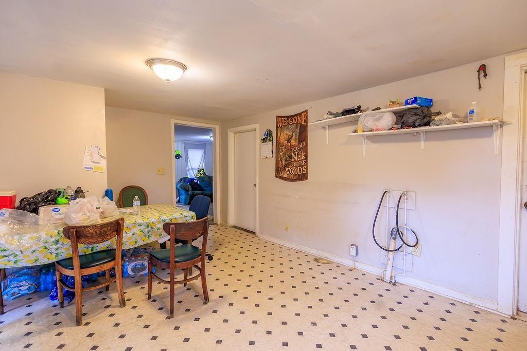 100 Daisy Circle Canton, GA 30114 - Photo 6 of 8 a workspace with furniture and window