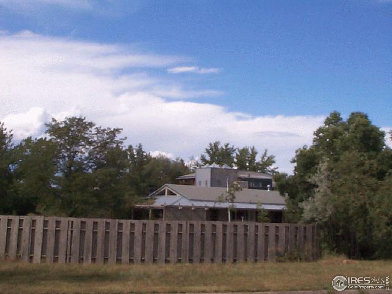 6367 Clearview Road Boulder, CO 80303 - Photo 8 of 8 a view of a houses with a yard