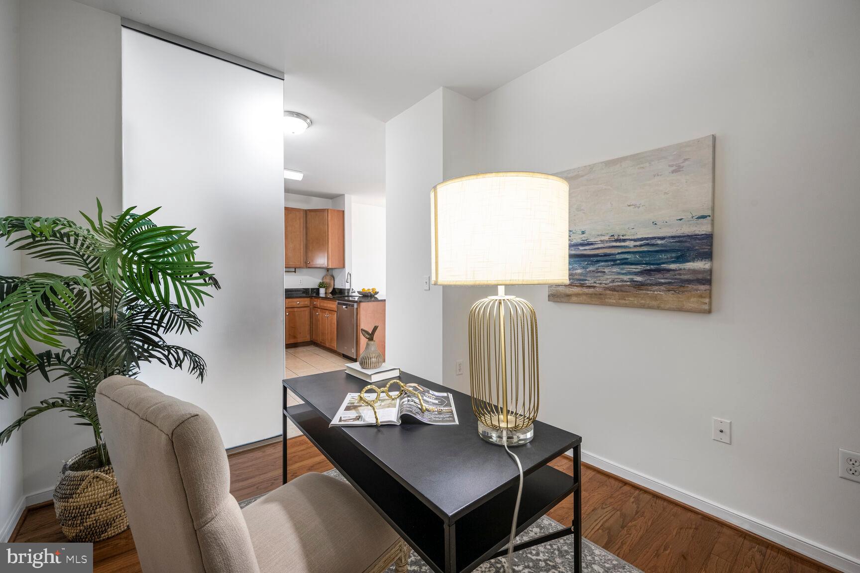 8045 Newell Street, Unit 516 Silver Spring, MD 20910 - Photo 21 of 33 a living room with furniture