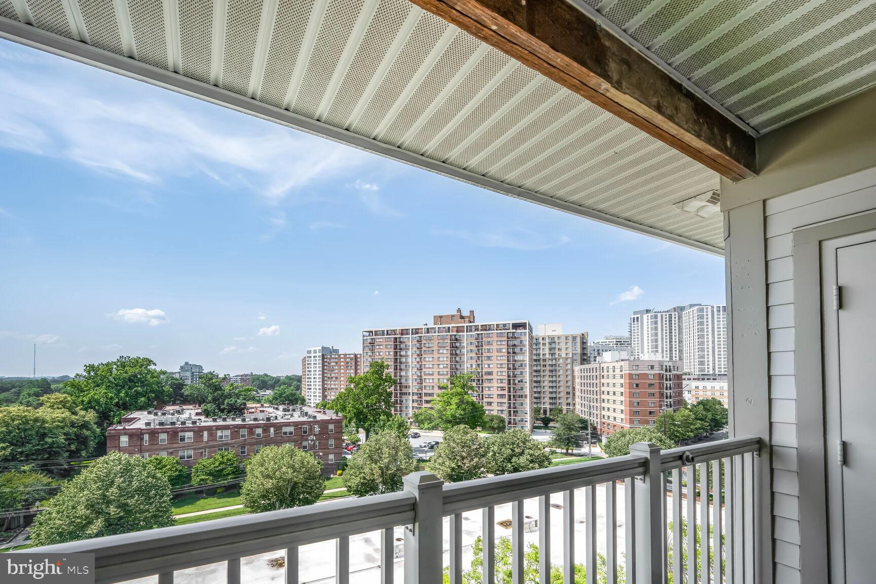 8045 Newell Street, Unit 516 Silver Spring, MD 20910 - Photo 24 of 33 a view of a city from a balcony