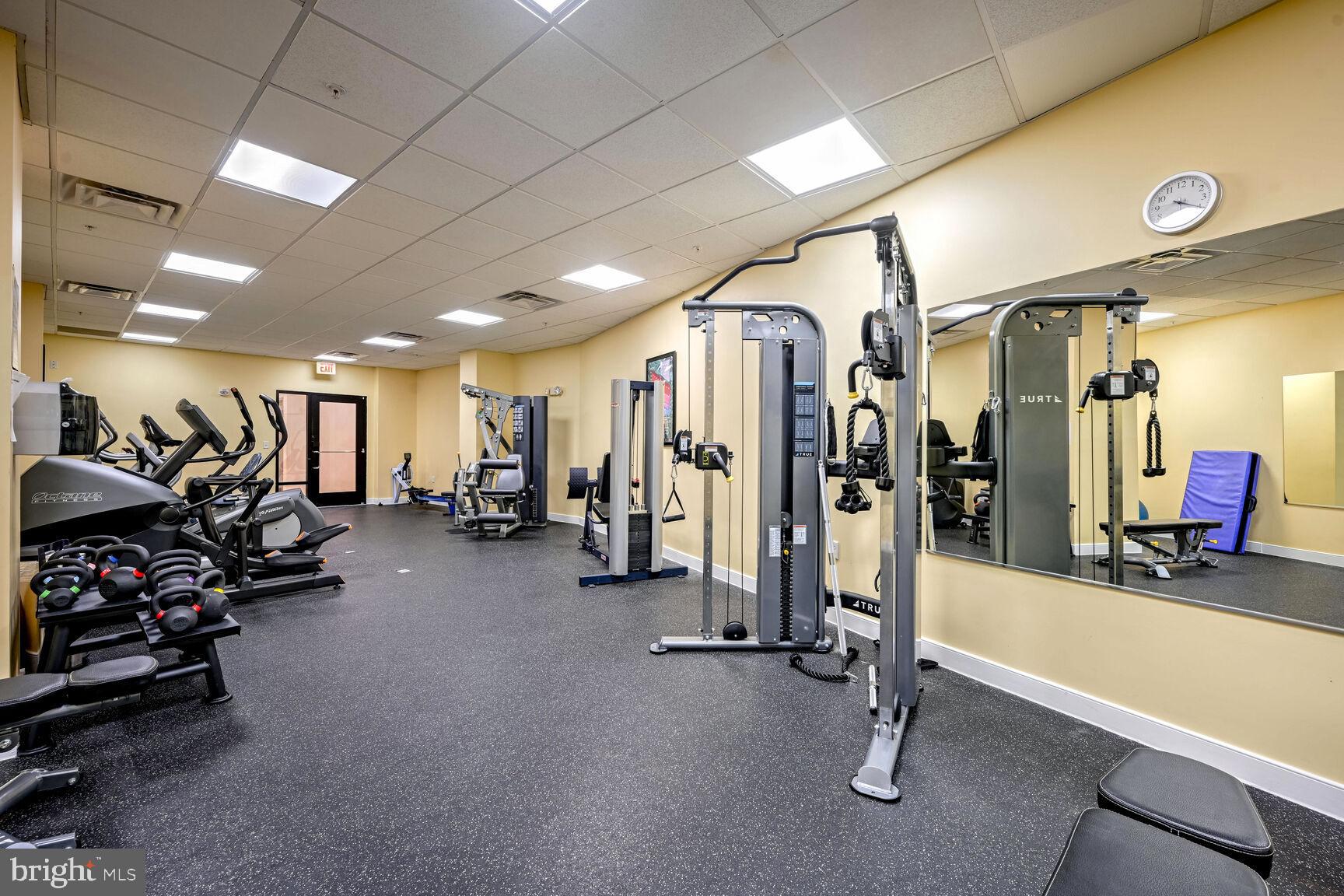 8045 Newell Street, Unit 516 Silver Spring, MD 20910 - Photo 28 of 33 a view of a room with gym equipment