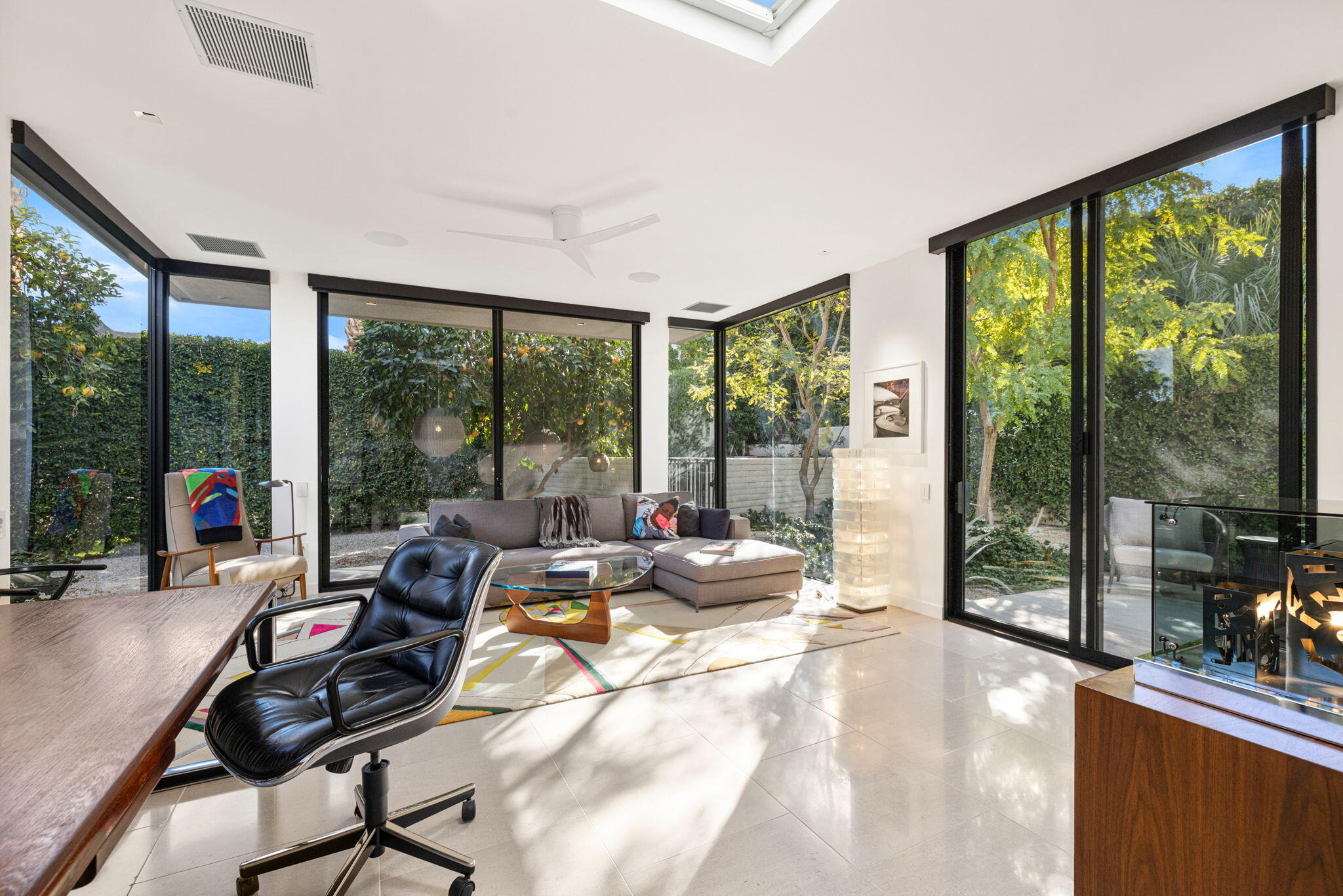 70149 Sonora Road Rancho Mirage, CA 92270 - Photo 25 of 48 a living room with furniture and windows