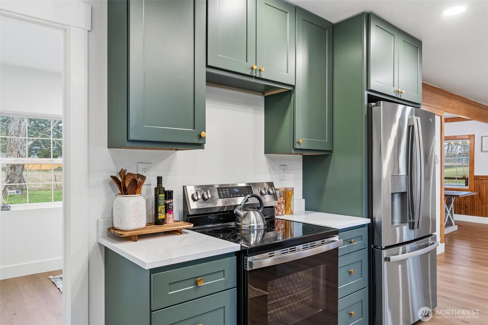 27805 Hinkleman Road East Buckley, WA 98321 - Photo 12 of 40 a kitchen with stainless steel appliances granite countertop a refrigerator and a sink