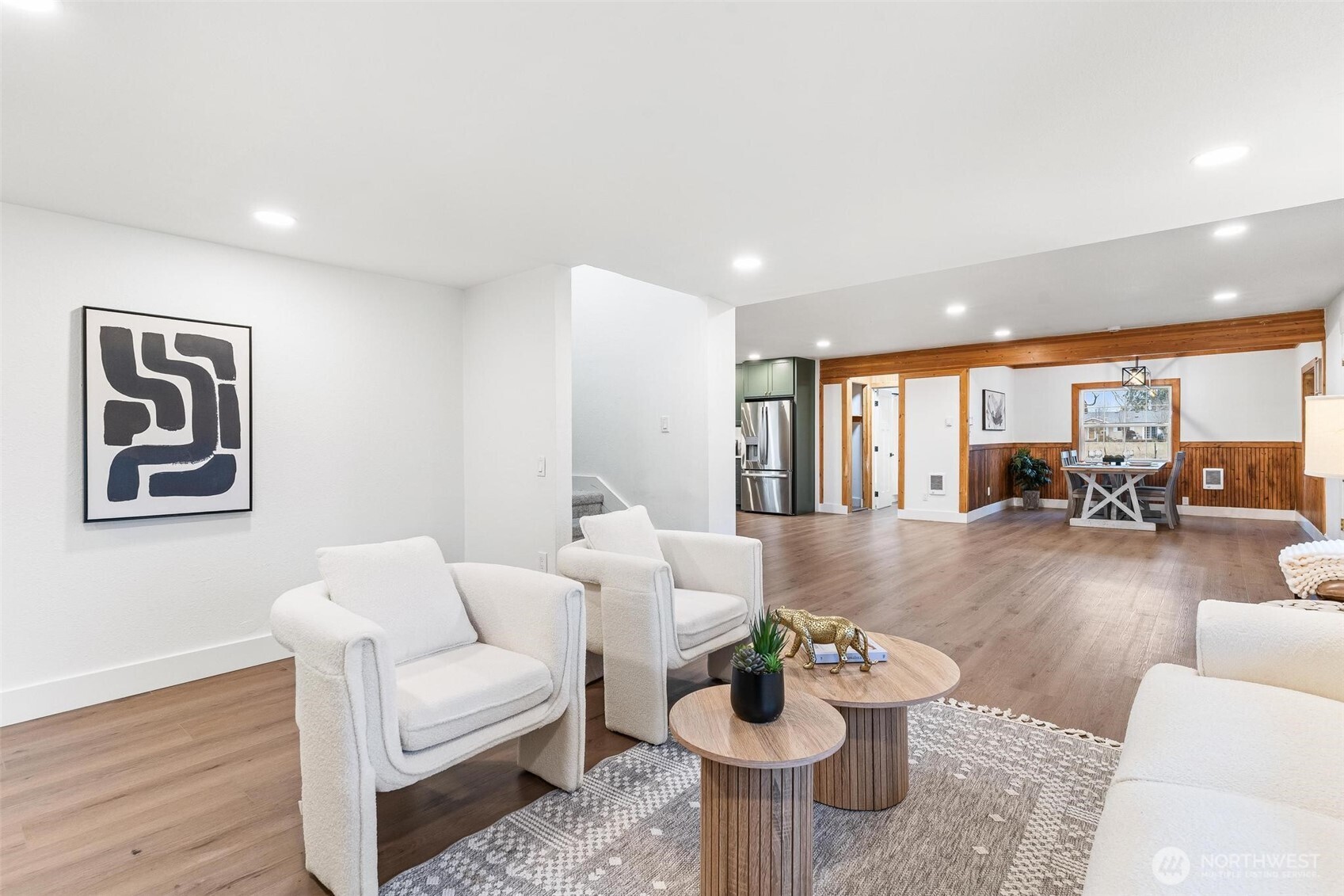 27805 Hinkleman Road East Buckley, WA 98321 - Photo 16 of 40 a living room with furniture and a wooden floor