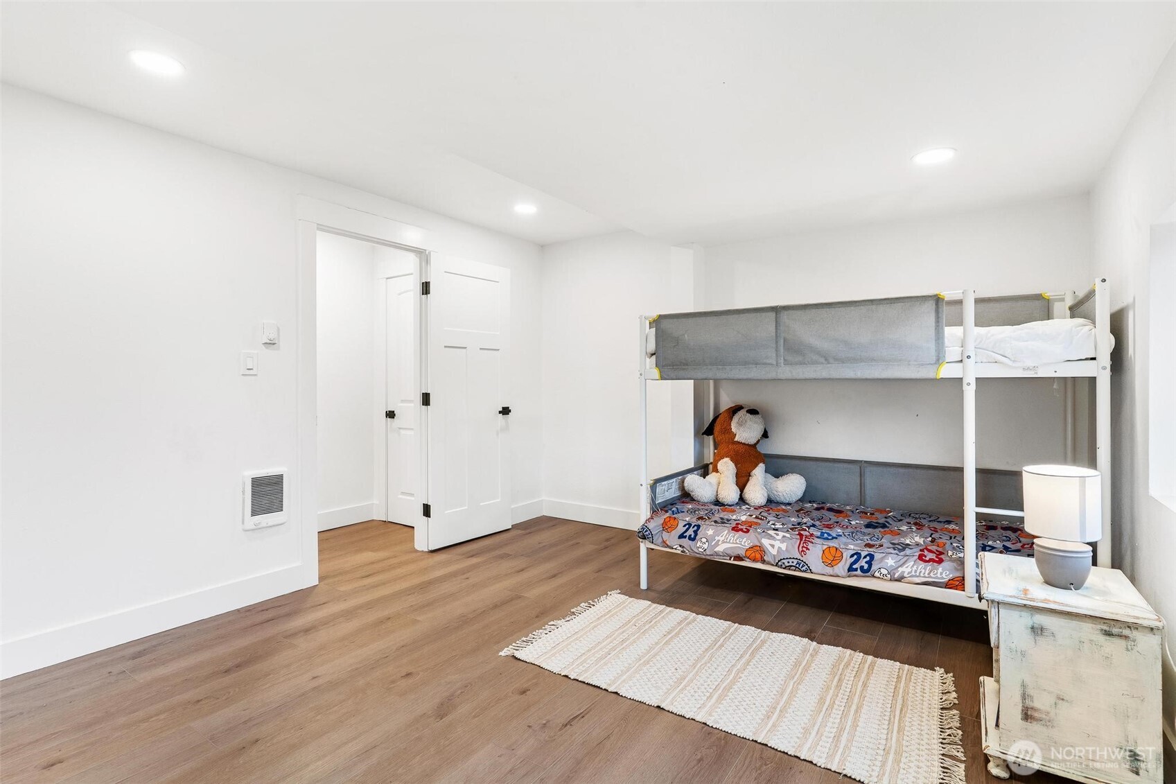 27805 Hinkleman Road East Buckley, WA 98321 - Photo 20 of 40 a bedroom with bunk beds and a view of kitchen