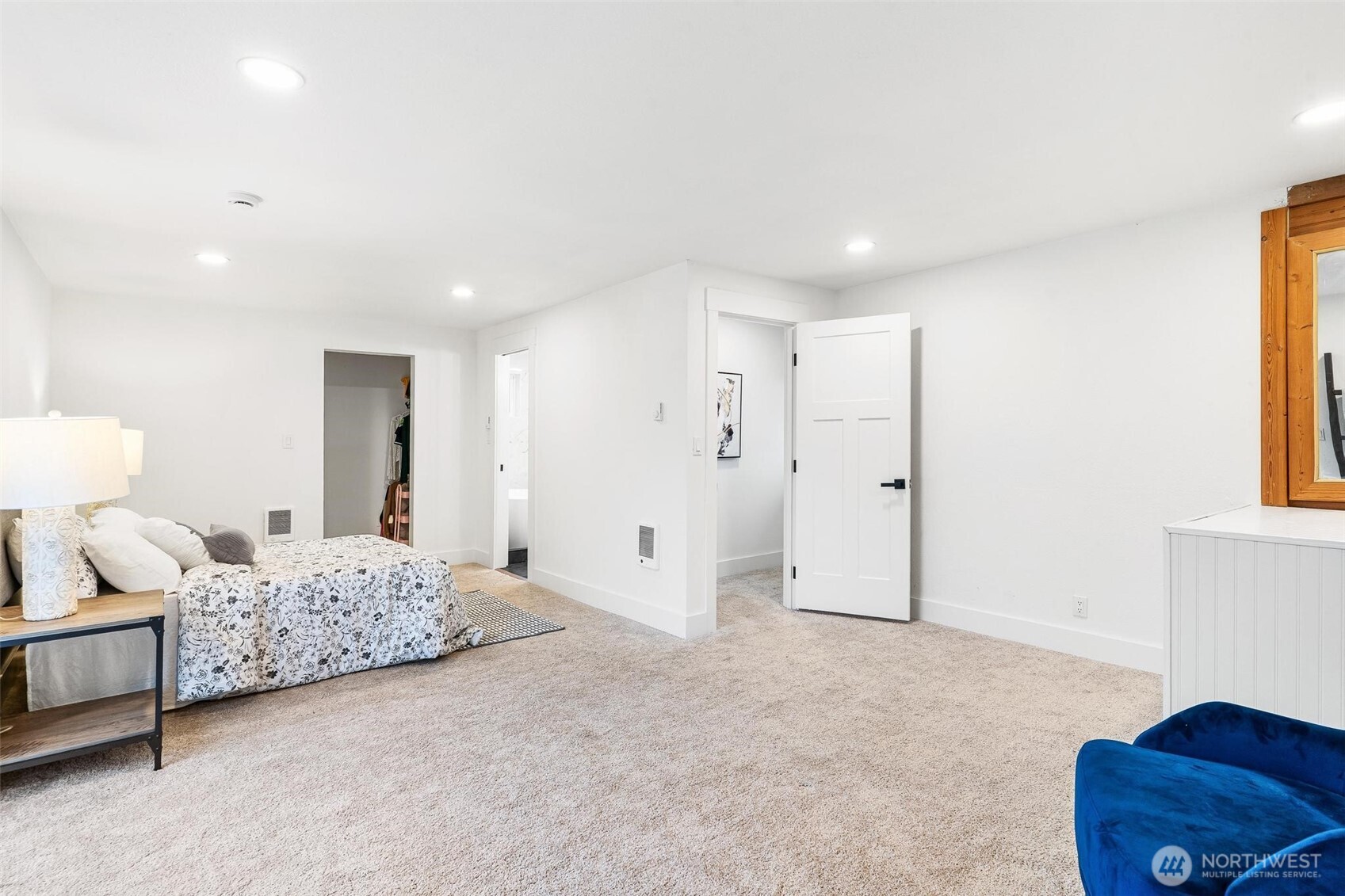 27805 Hinkleman Road East Buckley, WA 98321 - Photo 23 of 40 a spacious bedroom with a bed and a couch