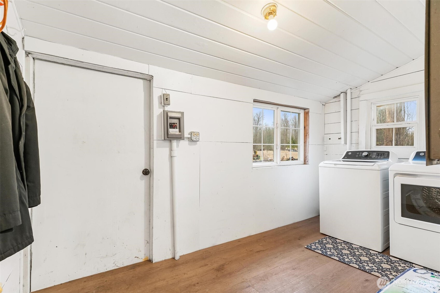 27805 Hinkleman Road East Buckley, WA 98321 - Photo 28 of 40 a view of a storage & utility room with washer and dryer