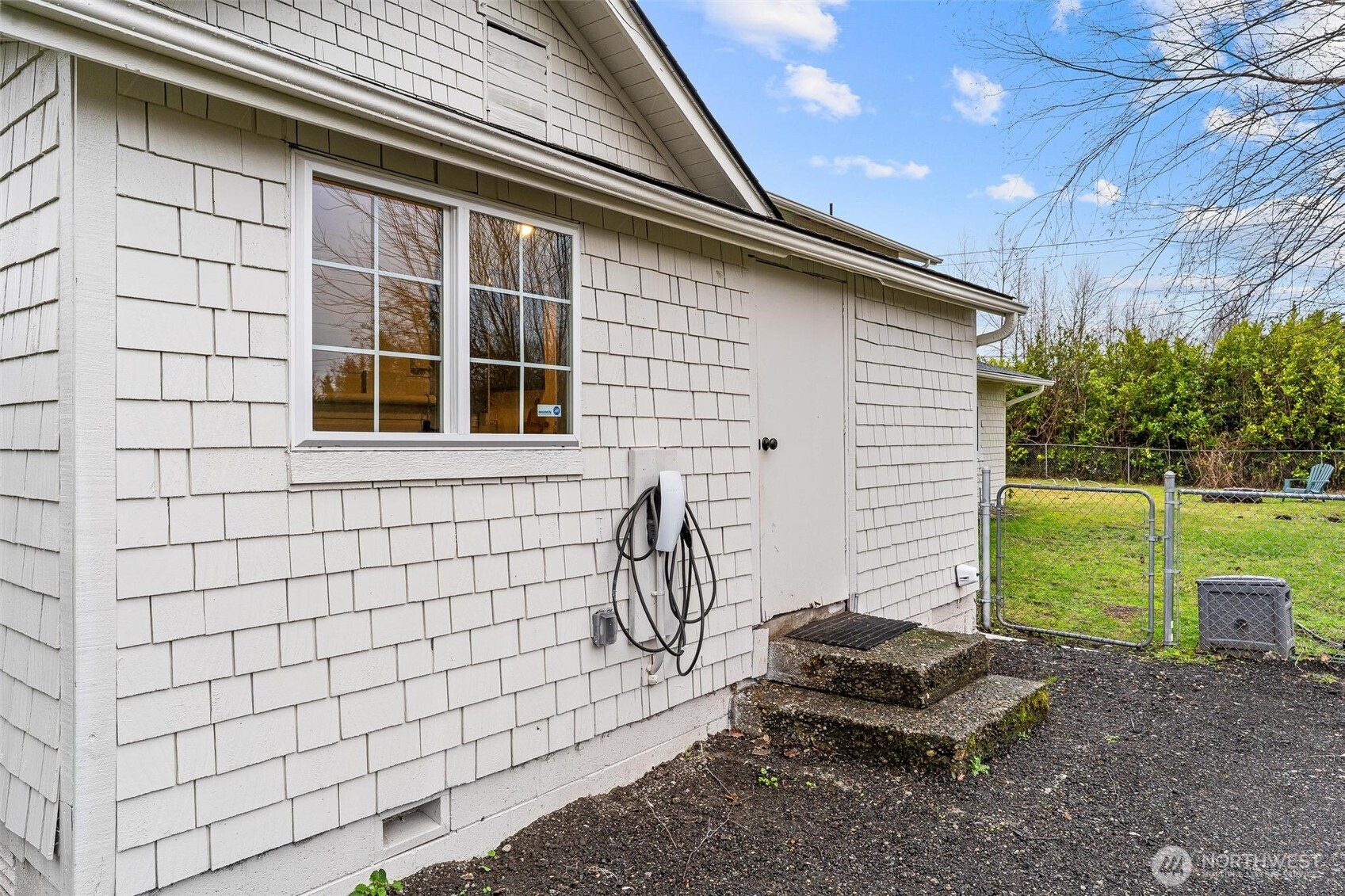 27805 Hinkleman Road East Buckley, WA 98321 - Photo 30 of 40 a backyard of a house with outdoor seating