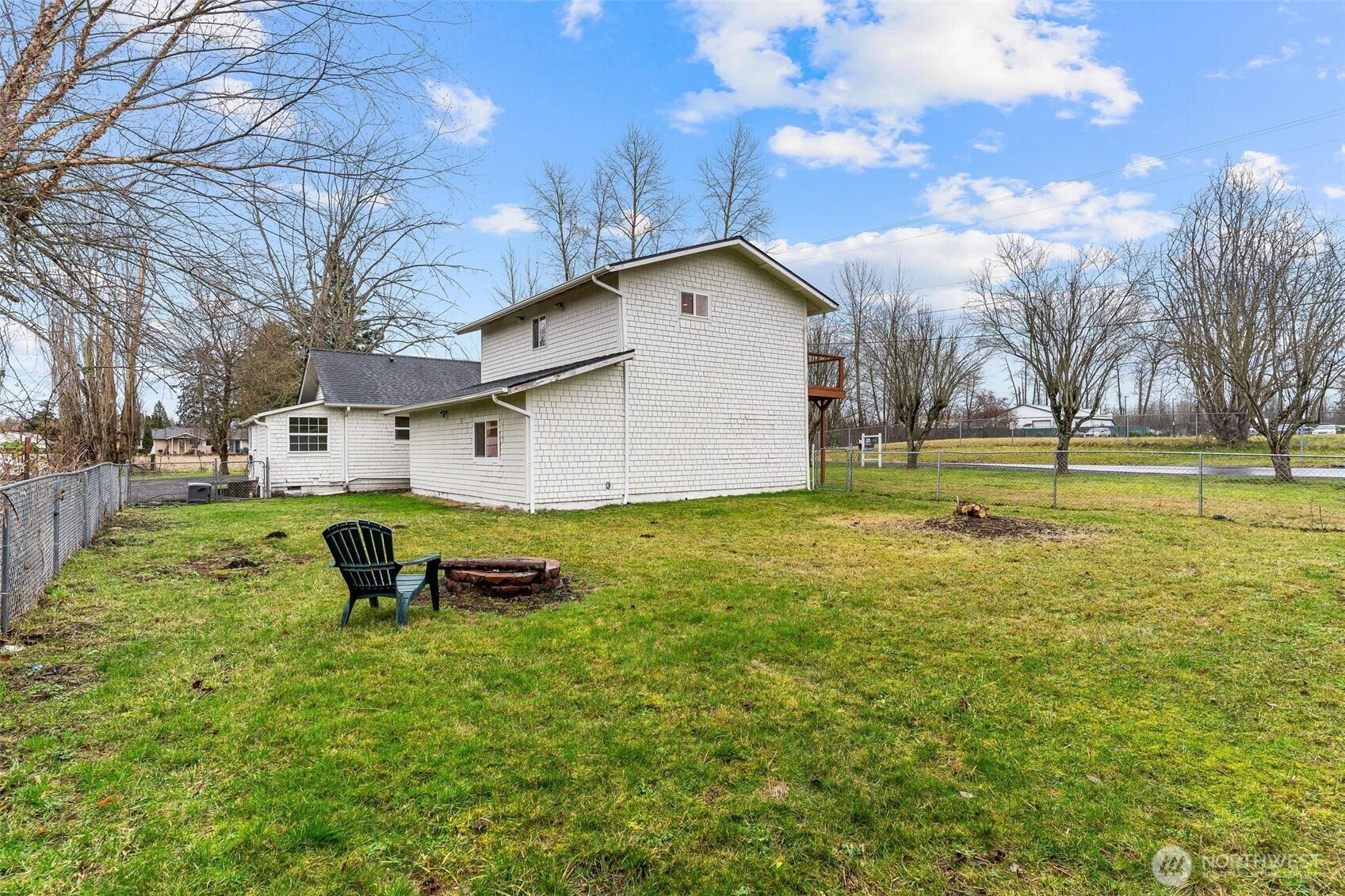 27805 Hinkleman Road East Buckley, WA 98321 - Photo 31 of 40 a house view with swimming pool and trees