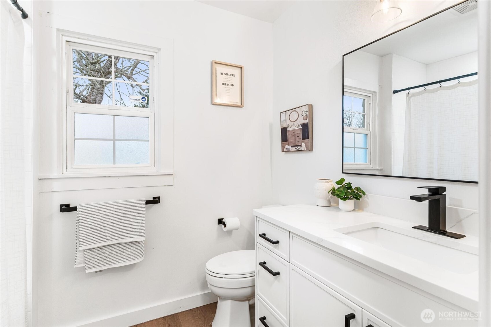 27805 Hinkleman Road East Buckley, WA 98321 - Photo 7 of 40 a bathroom with a sink a toilet and a mirror