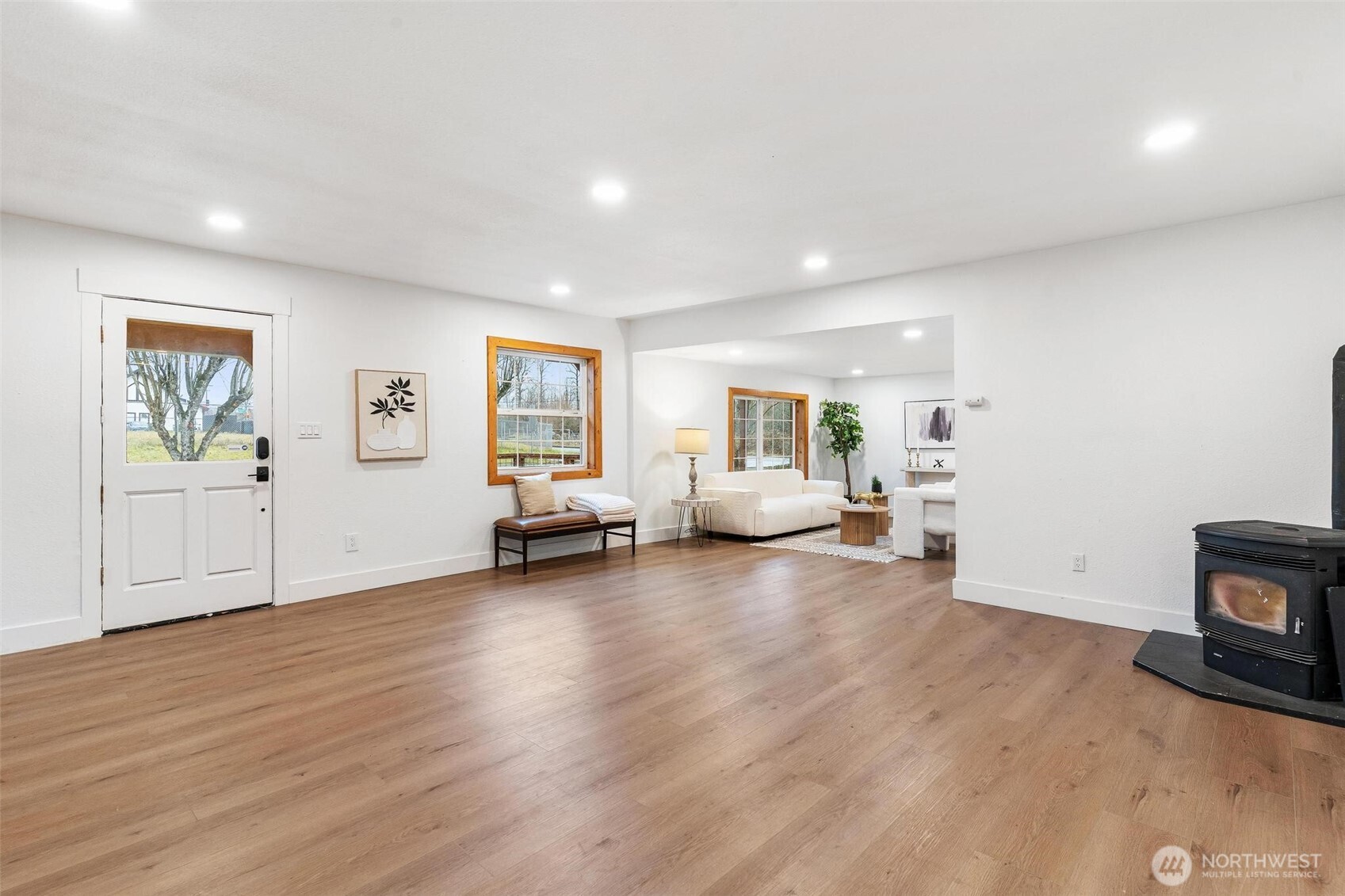 27805 Hinkleman Road East Buckley, WA 98321 - Photo 9 of 40 a living room with furniture and a wooden floor