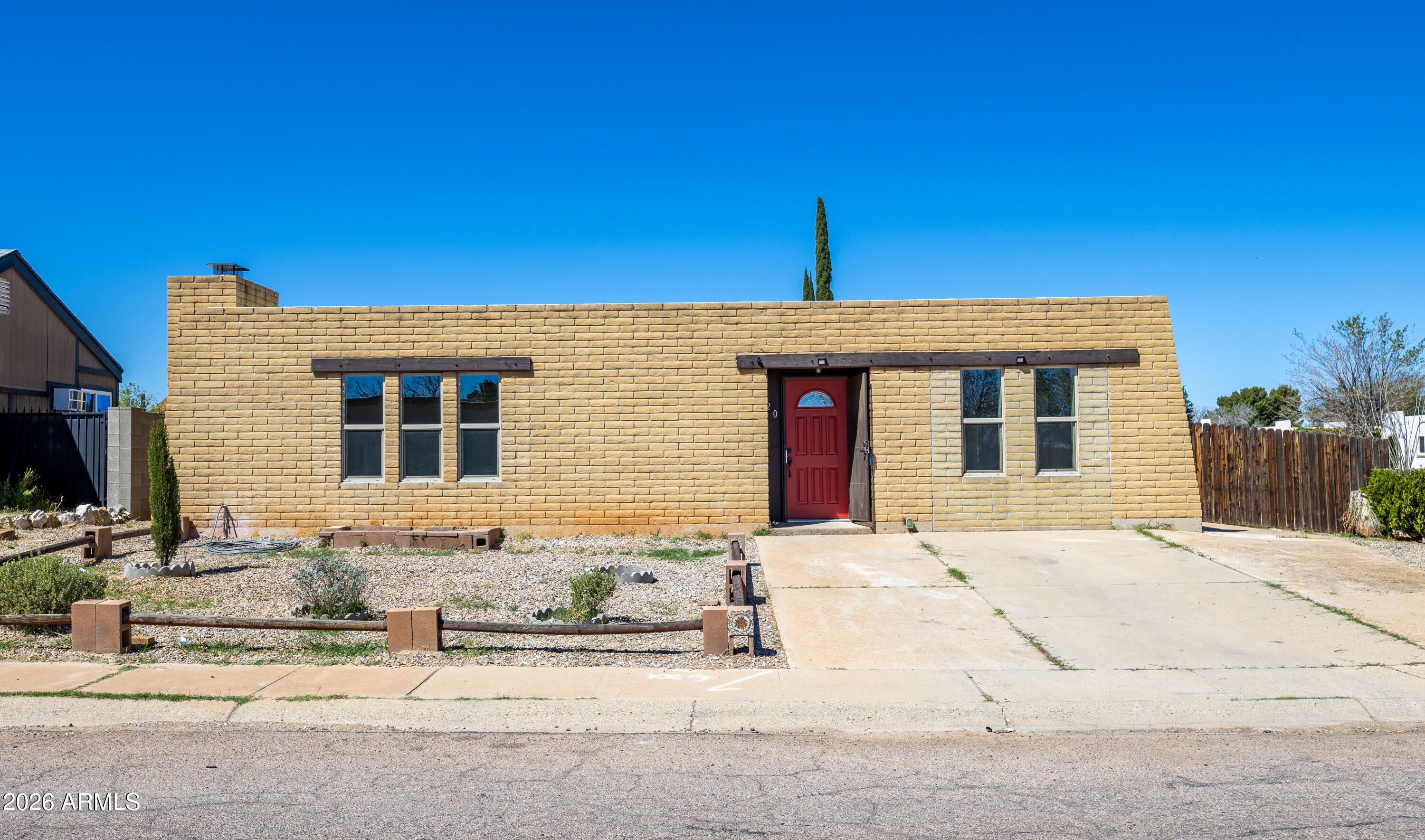 520 South 3rd Street Sierra Vista, AZ 85635 - Photo 1 of 28 a front view of a house with a empty space