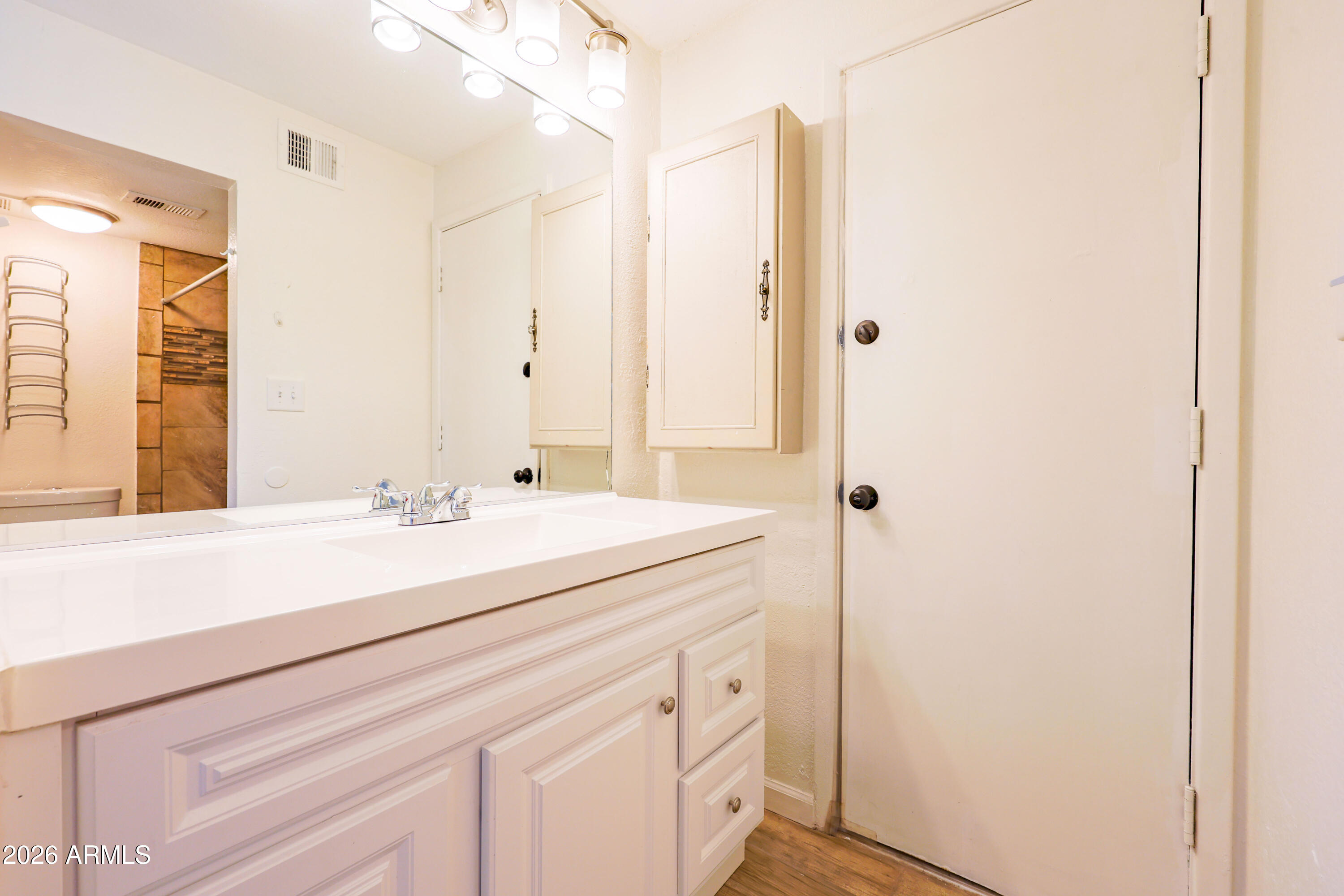 520 South 3rd Street Sierra Vista, AZ 85635 - Photo 19 of 28 a bathroom with a sink and a mirror