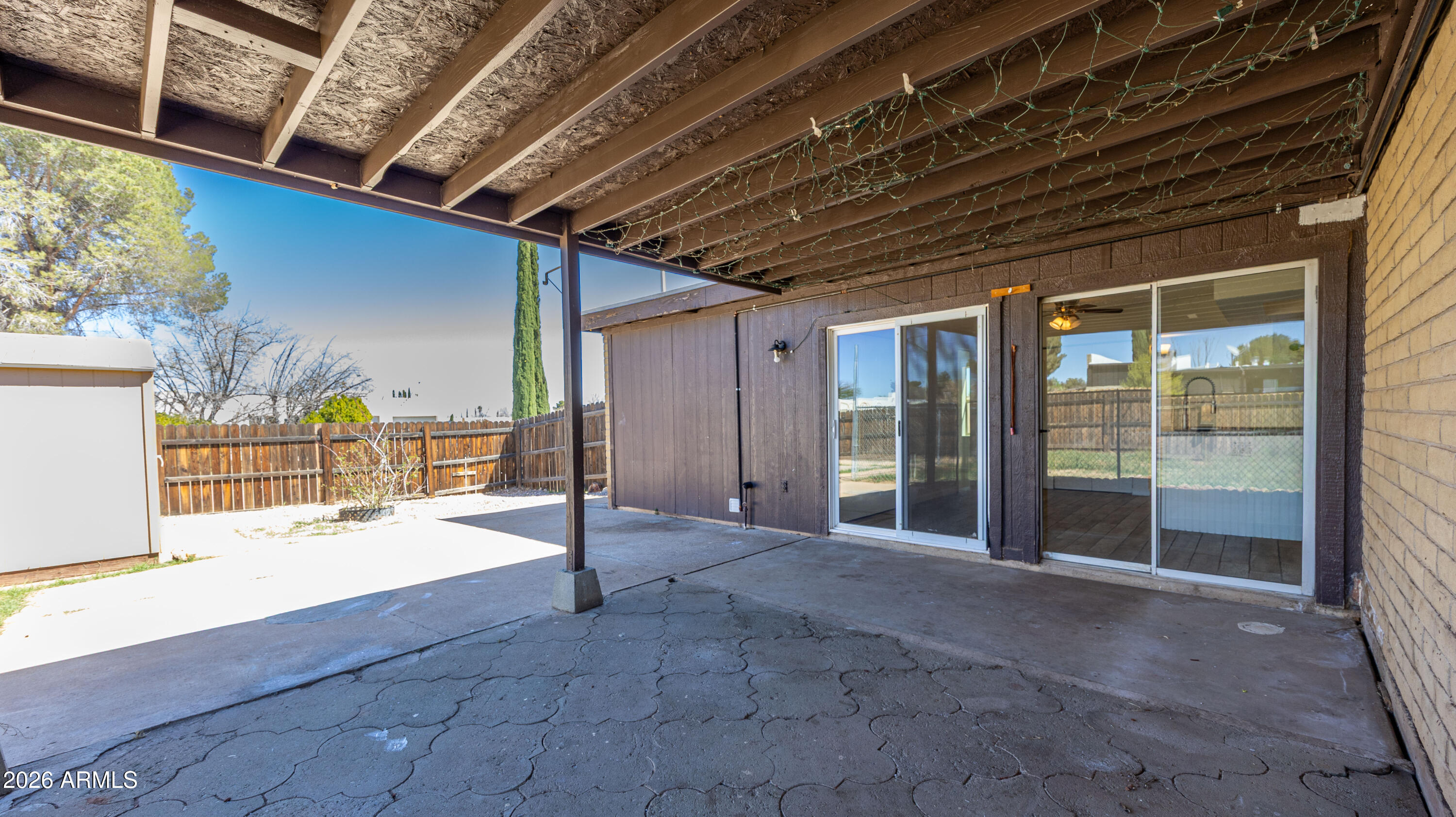 520 South 3rd Street Sierra Vista, AZ 85635 - Photo 22 of 28 a view of an empty room with floor to ceiling window and stairs