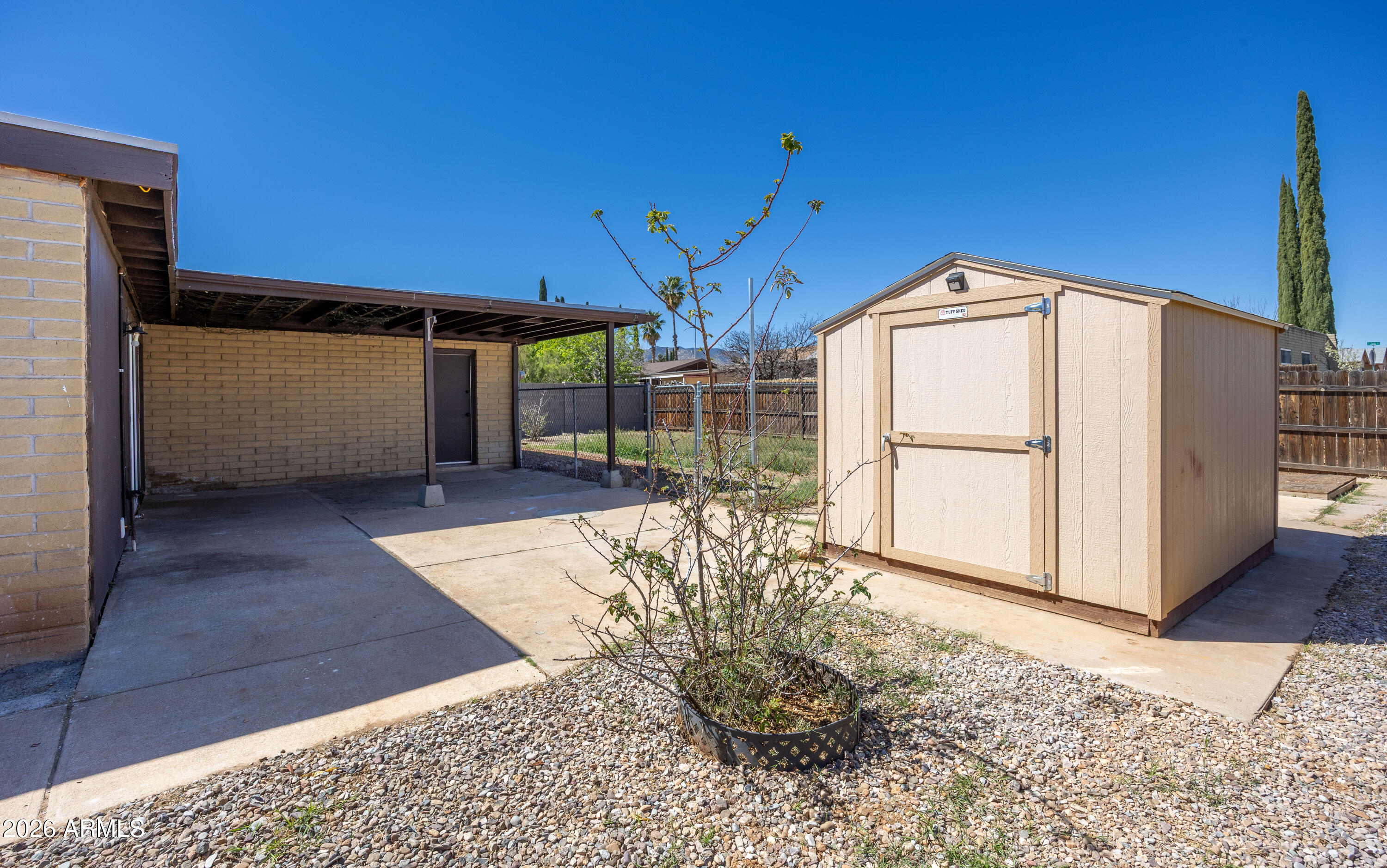 520 South 3rd Street Sierra Vista, AZ 85635 - Photo 23 of 28 a view of a house with a wooden deck