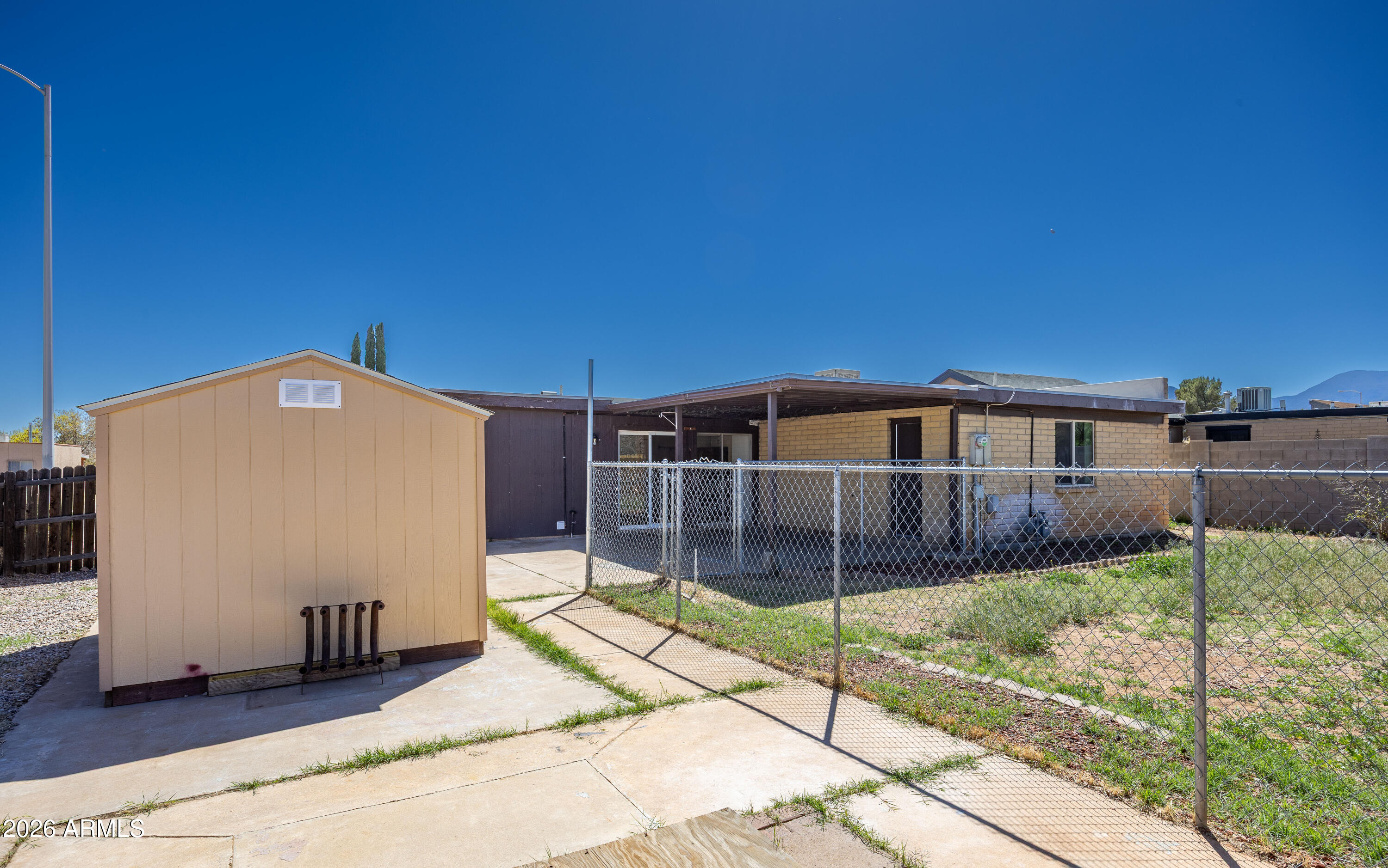 520 South 3rd Street Sierra Vista, AZ 85635 - Photo 24 of 28 a front view of a house with a yard