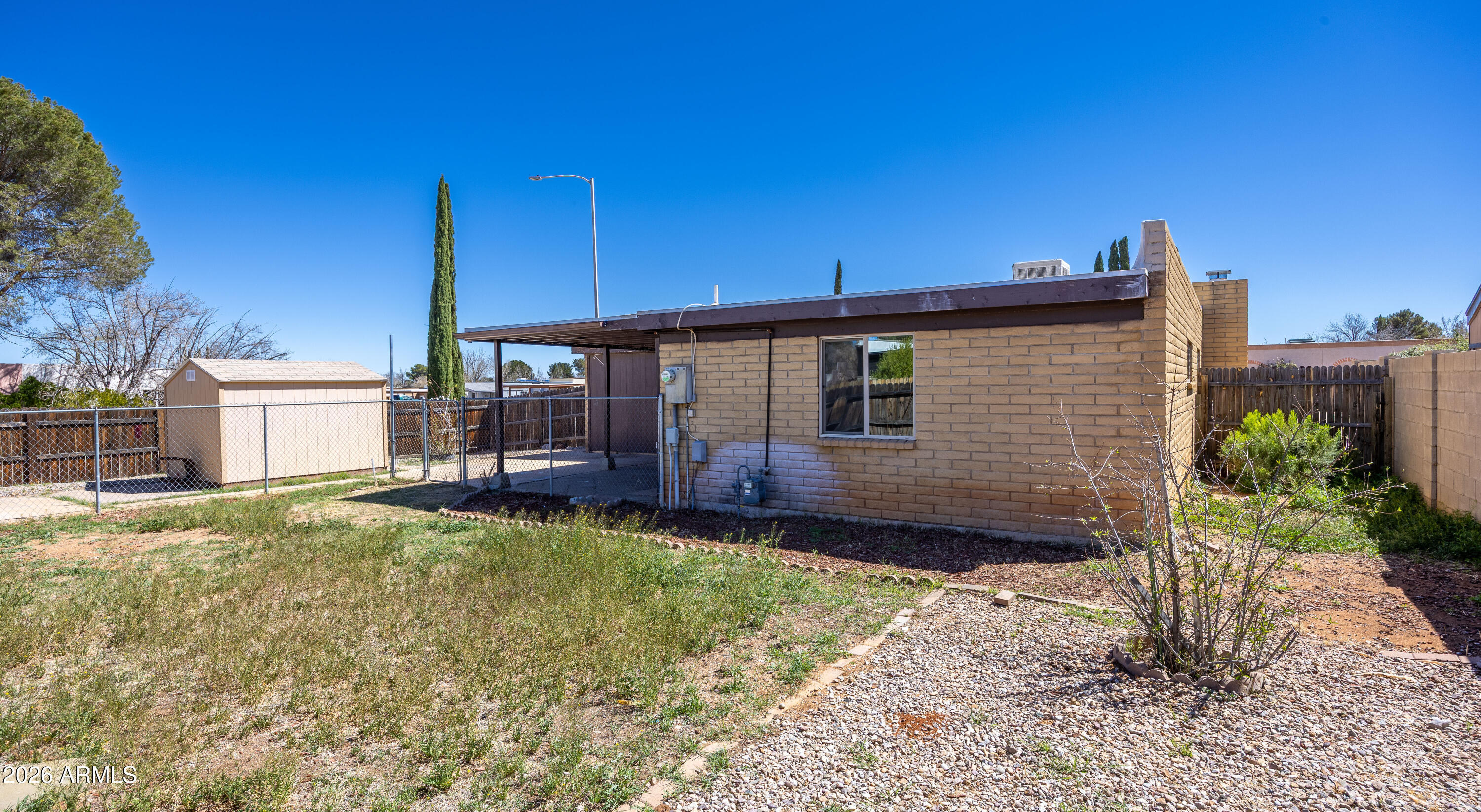 520 South 3rd Street Sierra Vista, AZ 85635 - Photo 25 of 28 a view of a house with backyard and deck