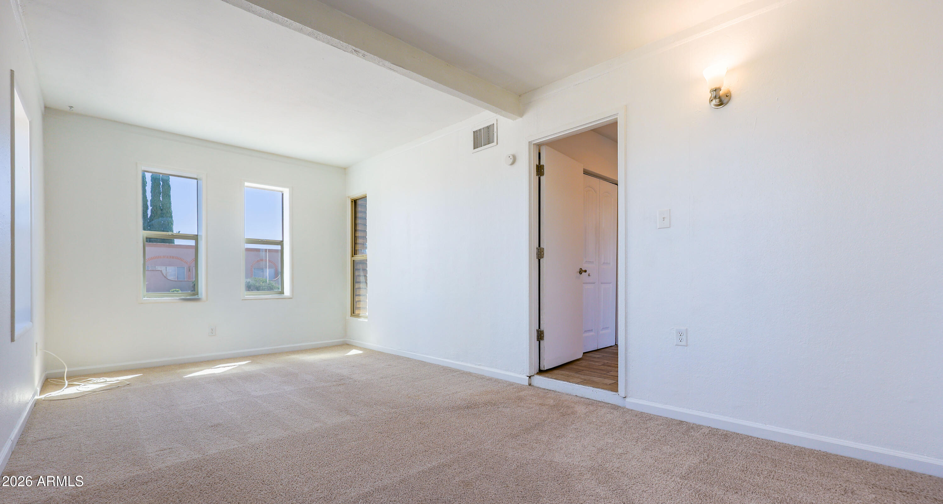 520 South 3rd Street Sierra Vista, AZ 85635 - Photo 10 of 28 a view of an empty room with a window