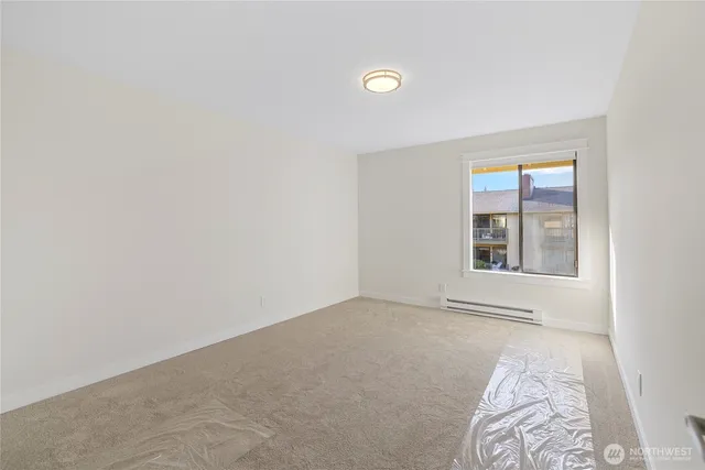 an empty room with windows