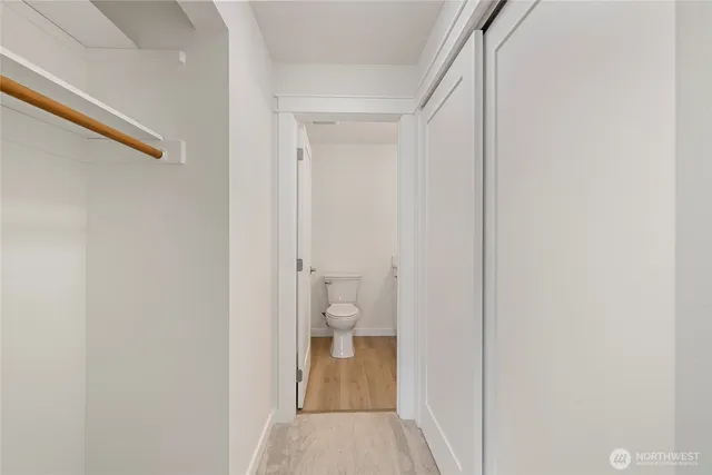 a view of a bathroom from a hallway