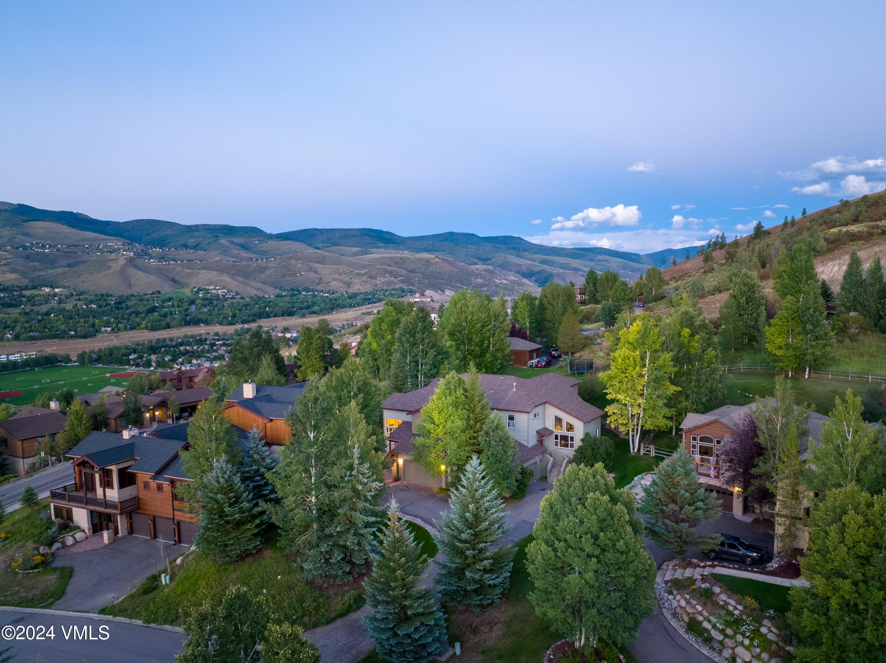 46 Andover Trail, Unit A Edwards, CO 81632 - Photo 1 of 27 a view of a city with sunset view