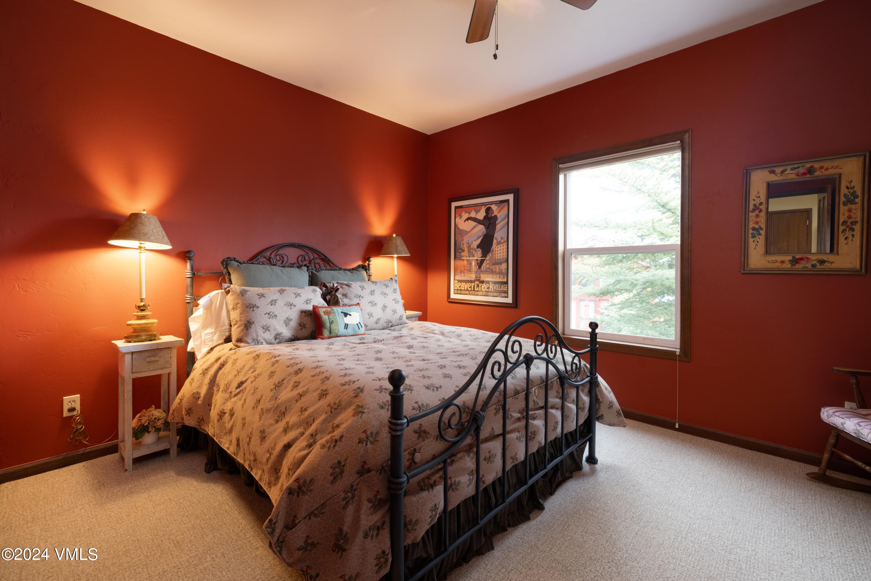 46 Andover Trail, Unit A Edwards, CO 81632 - Photo 12 of 27 a bed sitting in a bedroom next to a window