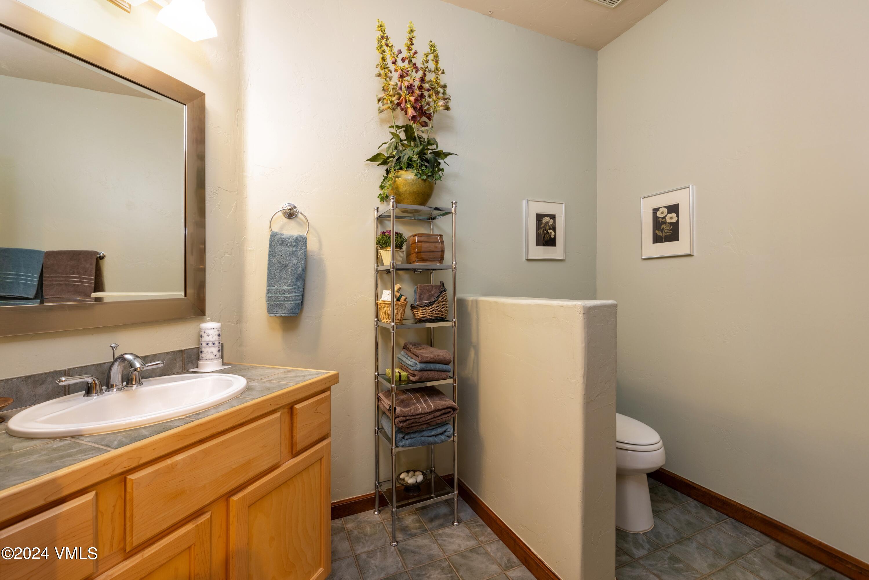 46 Andover Trail, Unit A Edwards, CO 81632 - Photo 13 of 27 a bathroom with a sink toilet and shower